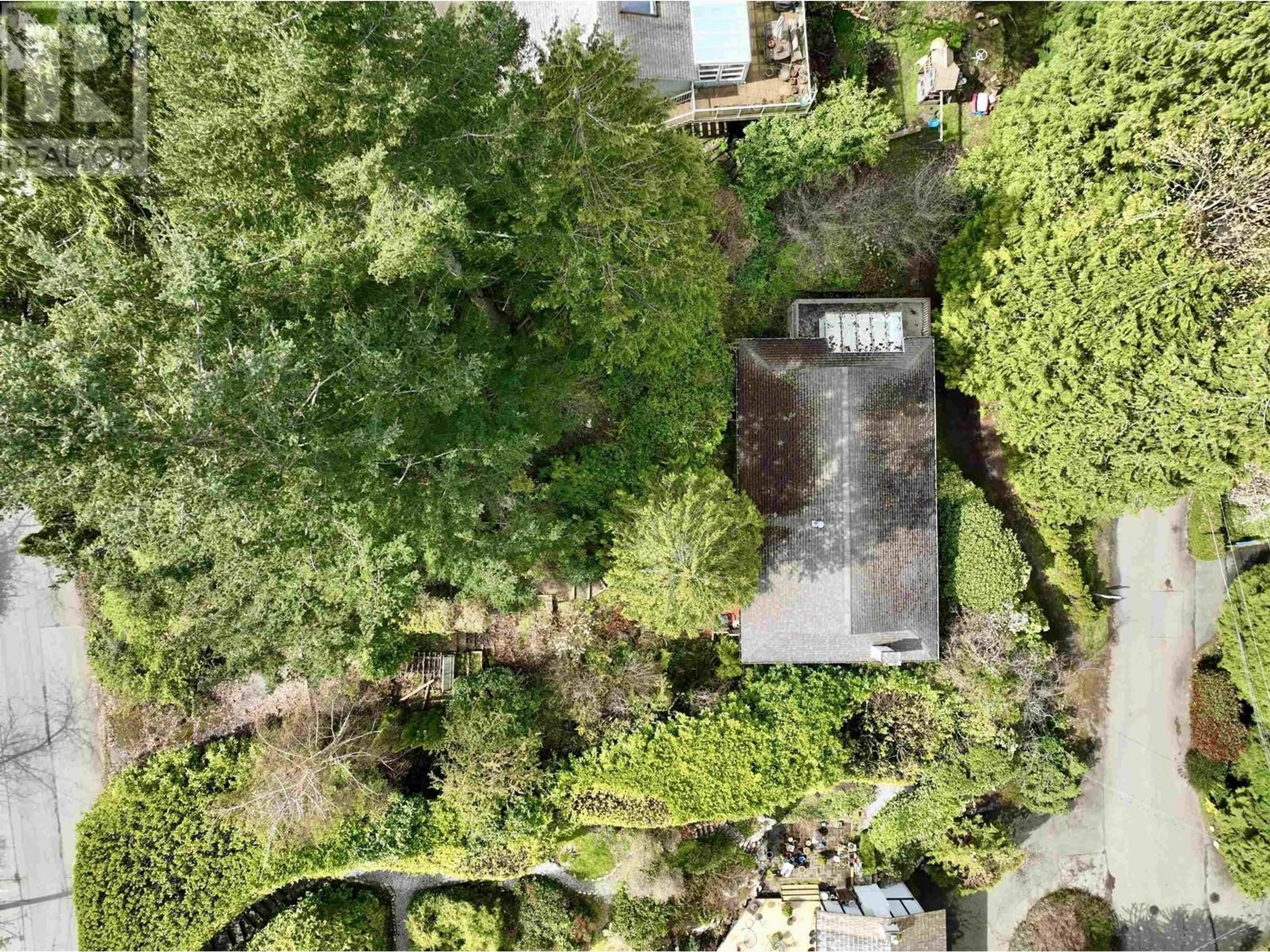 A pic from outside/outdoor area/front of a property/back of a property/a pic from drone, forest/trees view for 5686 KEITH ROAD, West Vancouver British Columbia V7W2N5