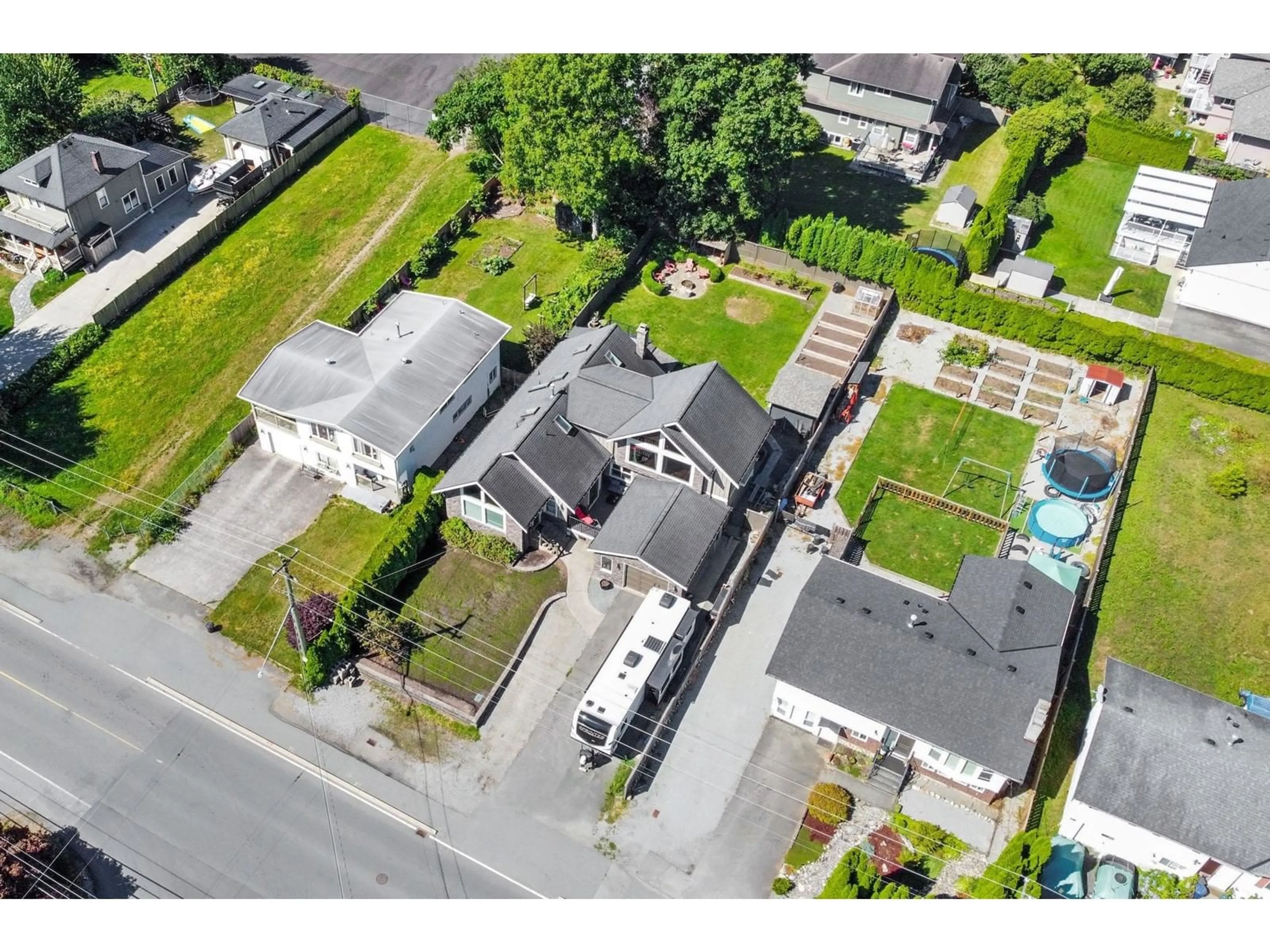 A pic from outside/outdoor area/front of a property/back of a property/a pic from drone, street for 8323 DEWDNEY TRUNK ROAD, Mission British Columbia V2S6S5