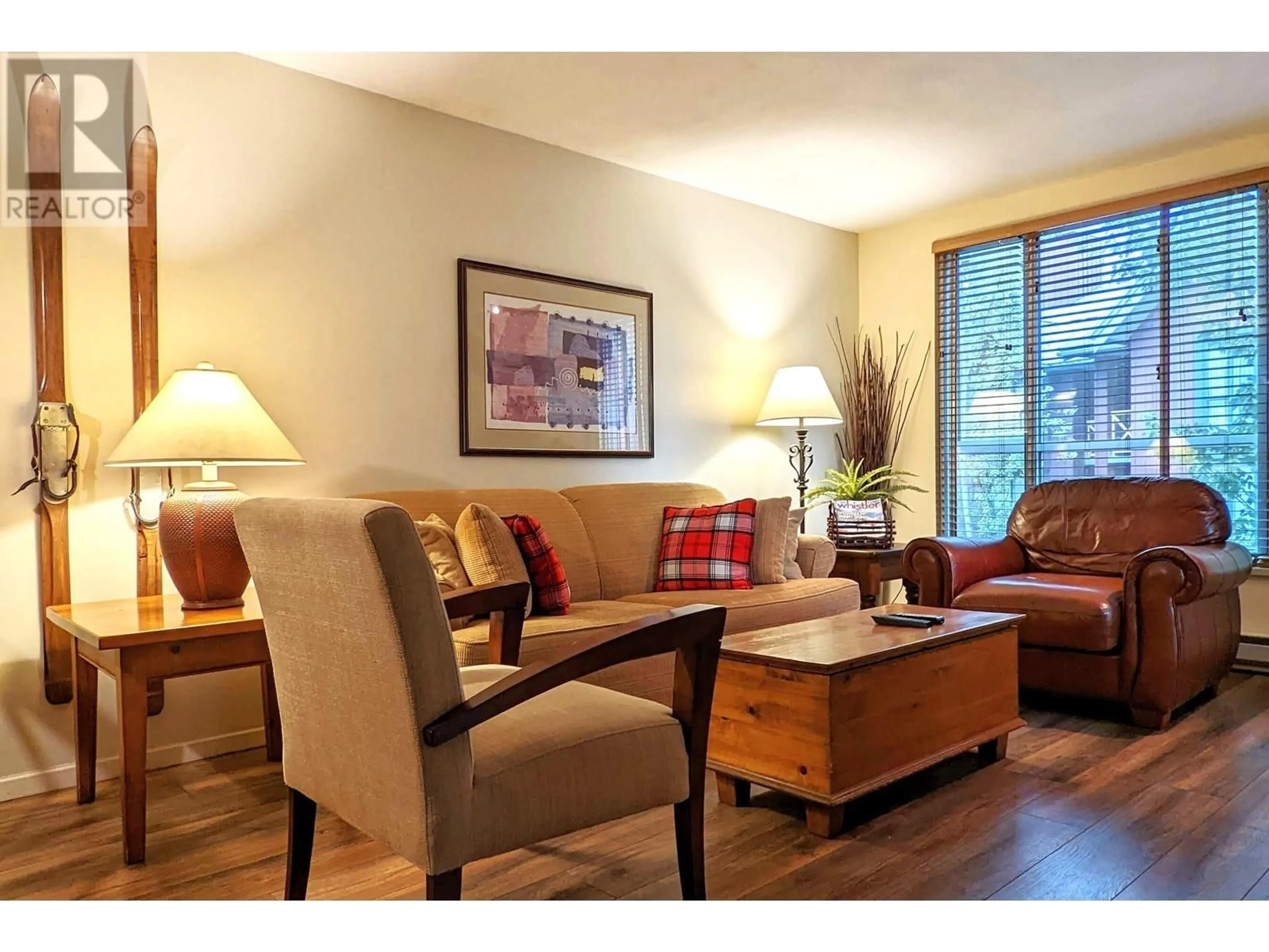 Living room with furniture, wood/laminate floor for 311 4314 MAIN STREET, Whistler British Columbia V8E1A8