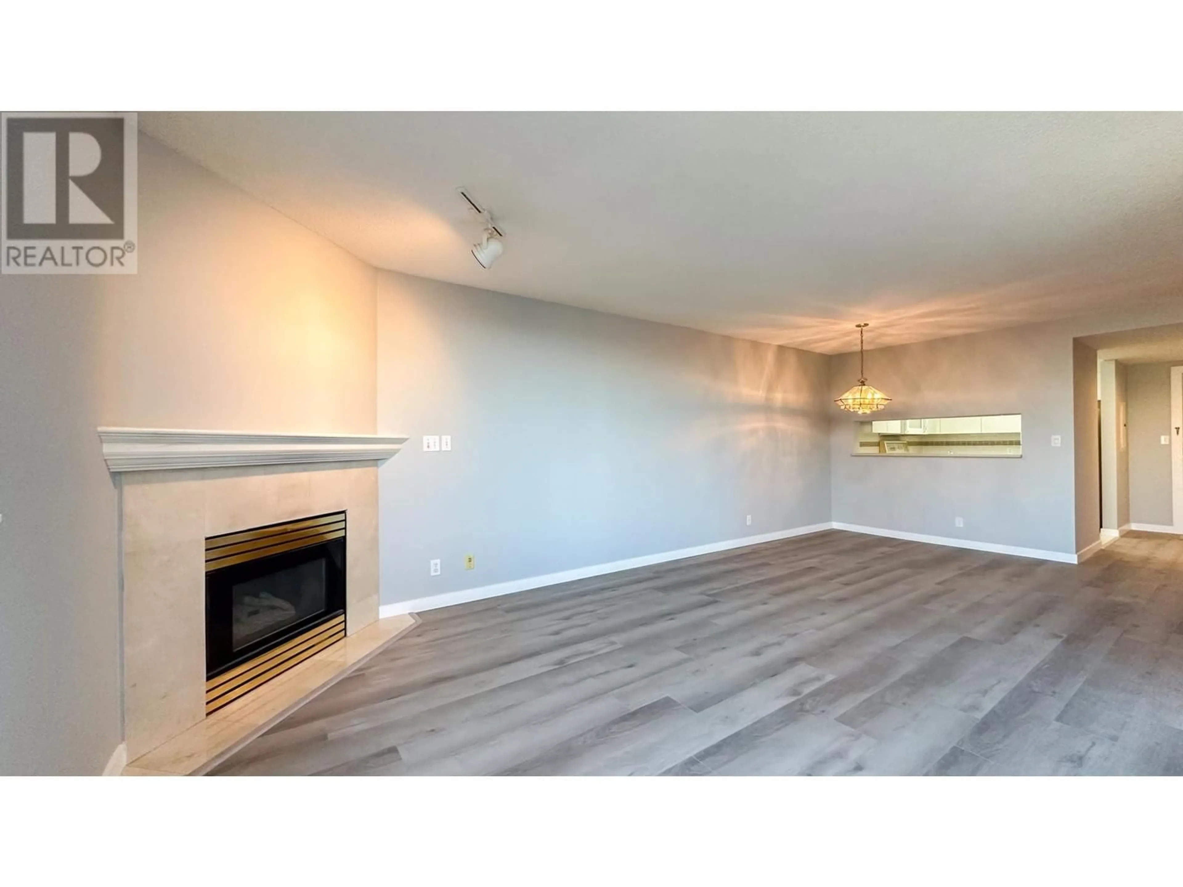 Living room with furniture, wood/laminate floor for 302 2438 HEATHER STREET, Vancouver British Columbia V5Z3H9