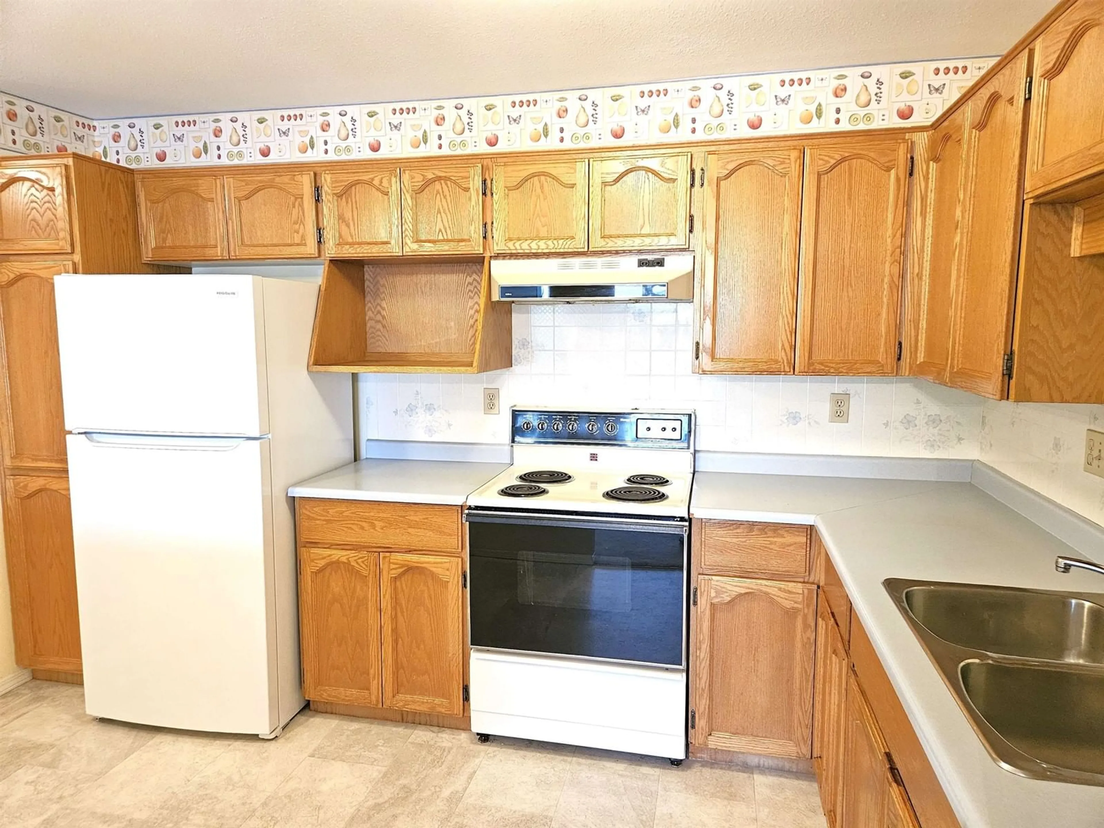 Standard kitchen, ceramic/tile floor for 218 33535 KING ROAD, Abbotsford British Columbia V2S6Z5