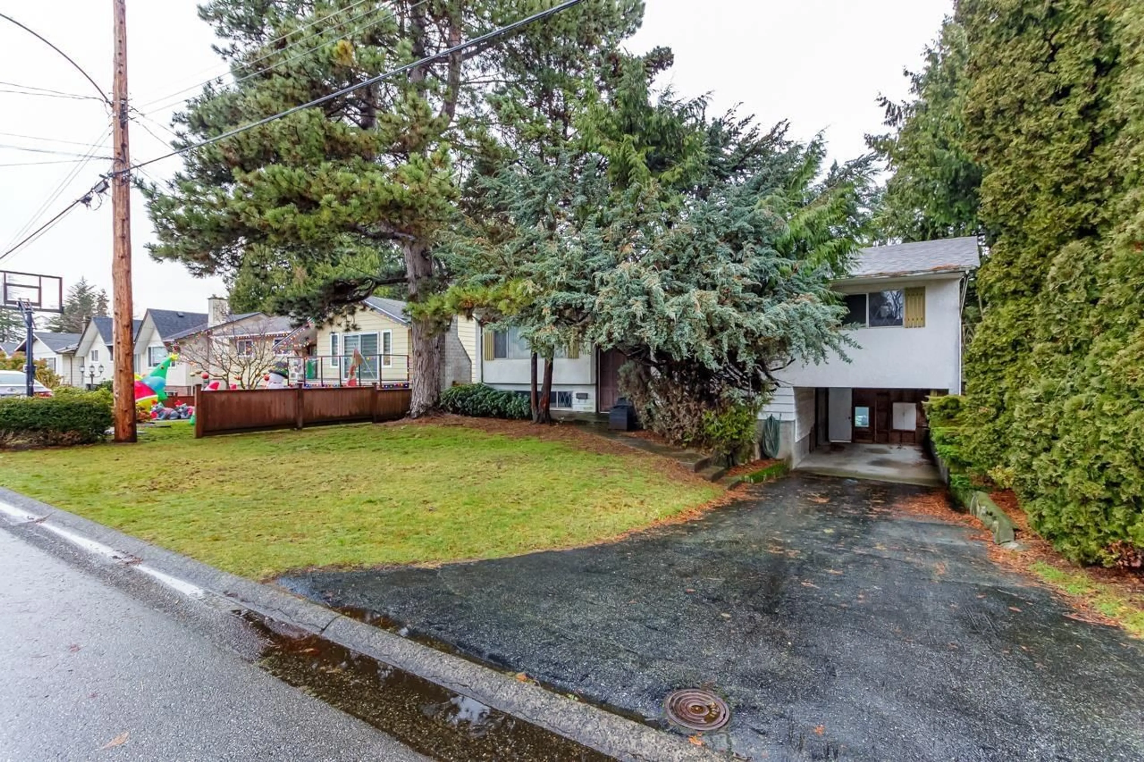 A pic from outside/outdoor area/front of a property/back of a property/a pic from drone, street for 11725 94A AVENUE, Delta British Columbia V4C3S4