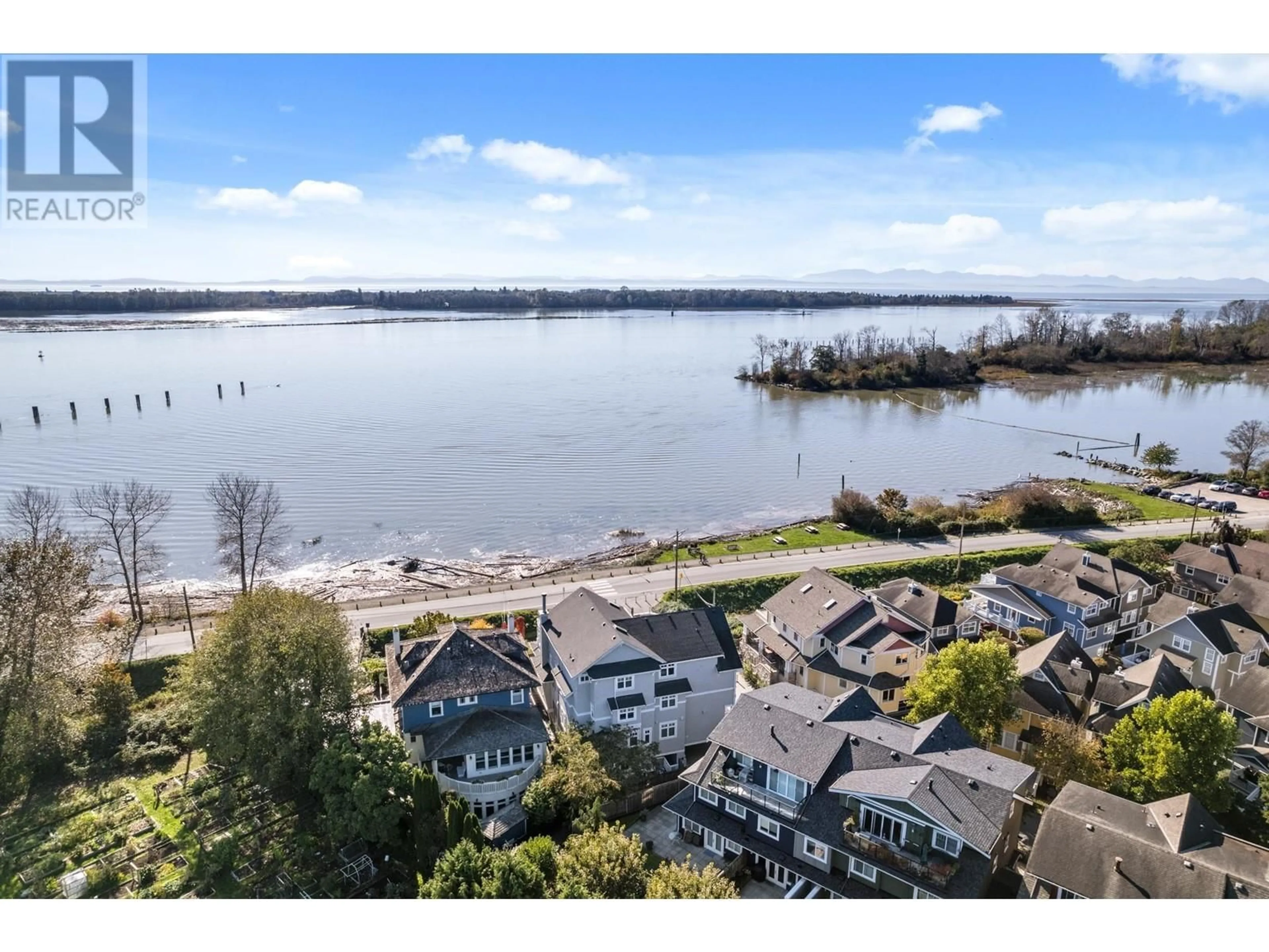 A pic from outside/outdoor area/front of a property/back of a property/a pic from drone, water/lake/river/ocean view for 6461 DYKE ROAD, Richmond British Columbia V7E3R3