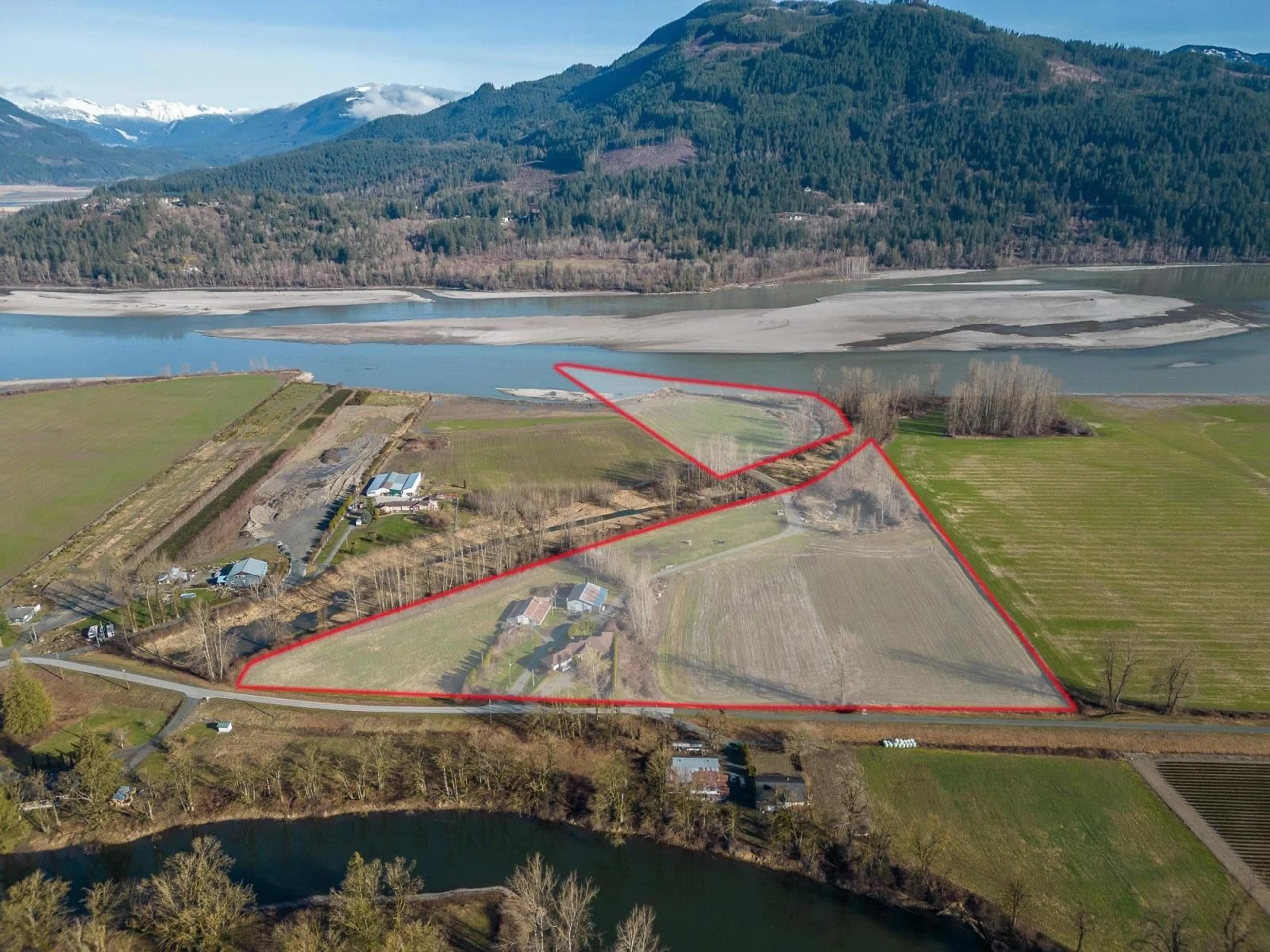 A pic from outside/outdoor area/front of a property/back of a property/a pic from drone, water/lake/river/ocean view for 47975 JESS ROAD, Chilliwack British Columbia V2P6H5