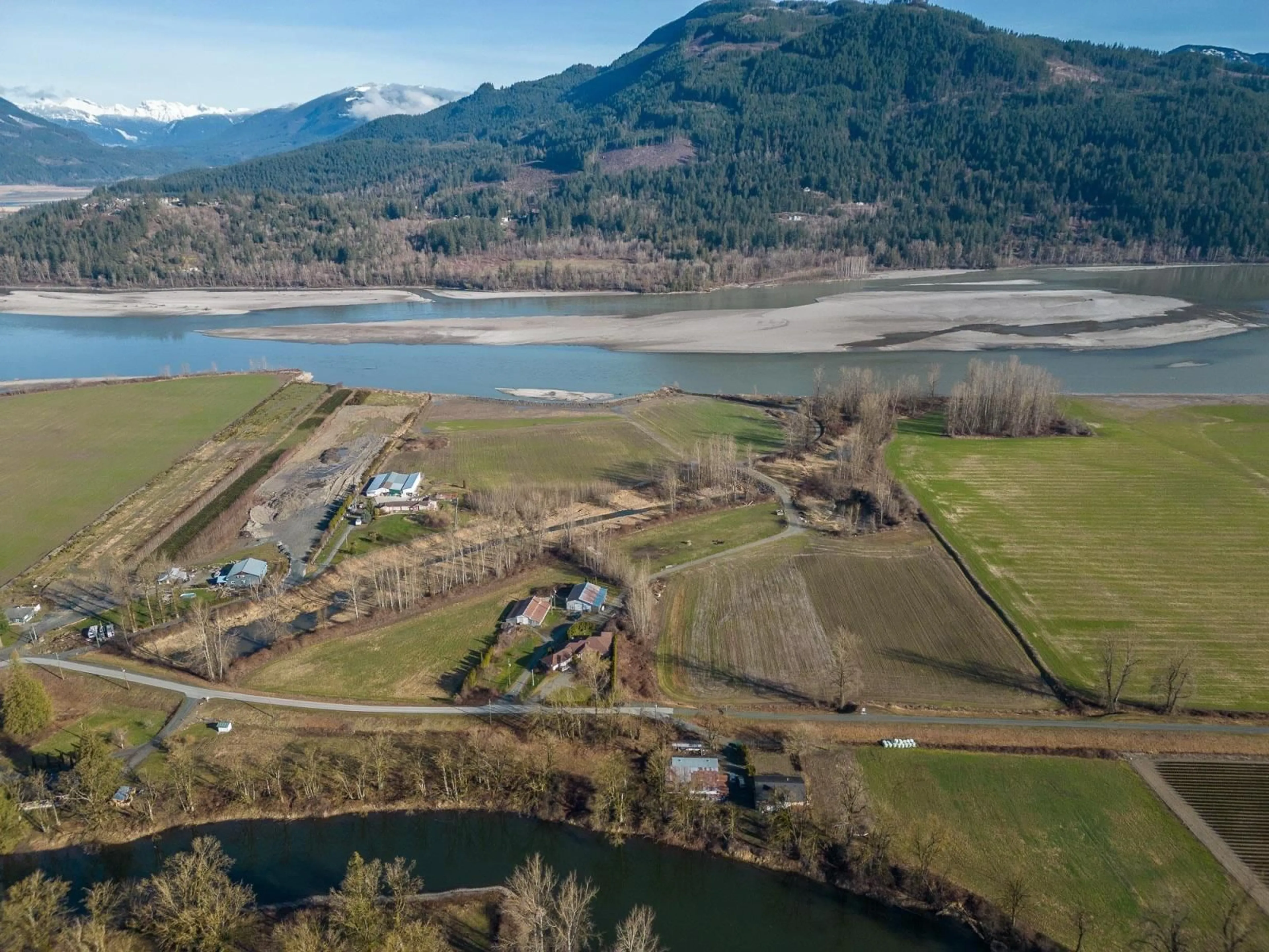 A pic from outside/outdoor area/front of a property/back of a property/a pic from drone, water/lake/river/ocean view for 47975 JESS ROAD, Chilliwack British Columbia V2P6H5