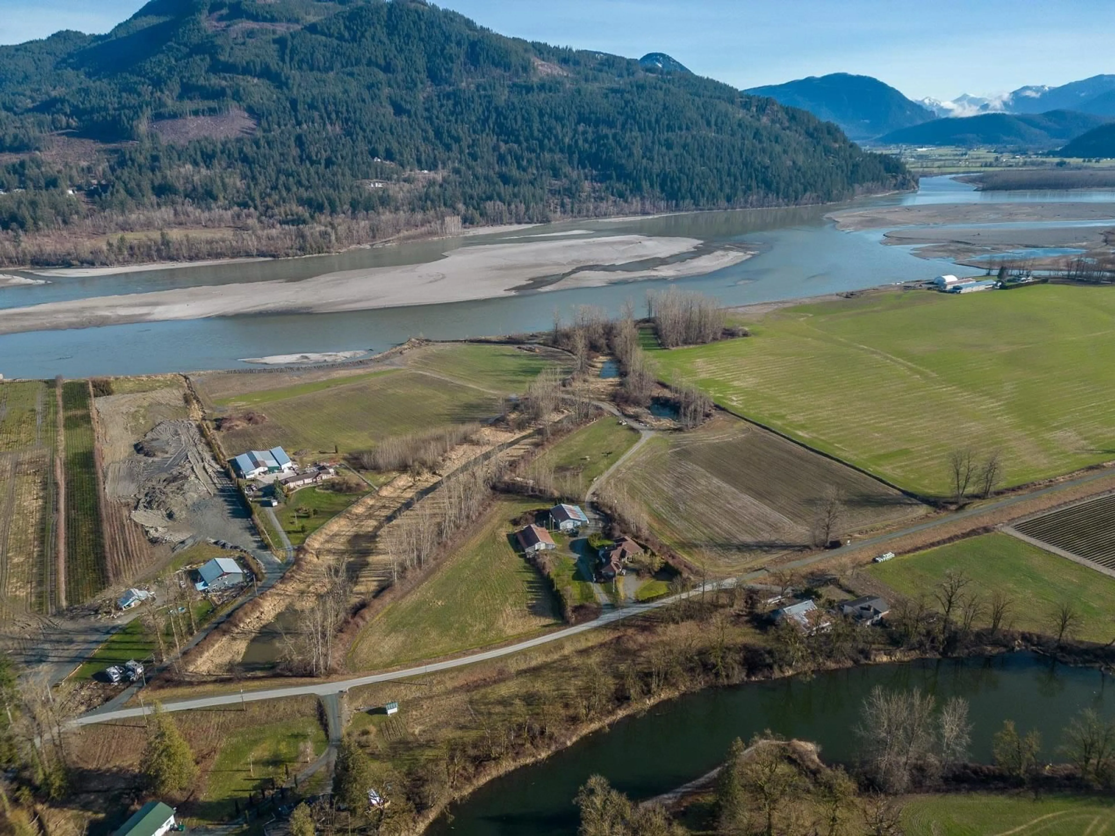 A pic from outside/outdoor area/front of a property/back of a property/a pic from drone, water/lake/river/ocean view for 47975 JESS ROAD, Chilliwack British Columbia V2P6H5