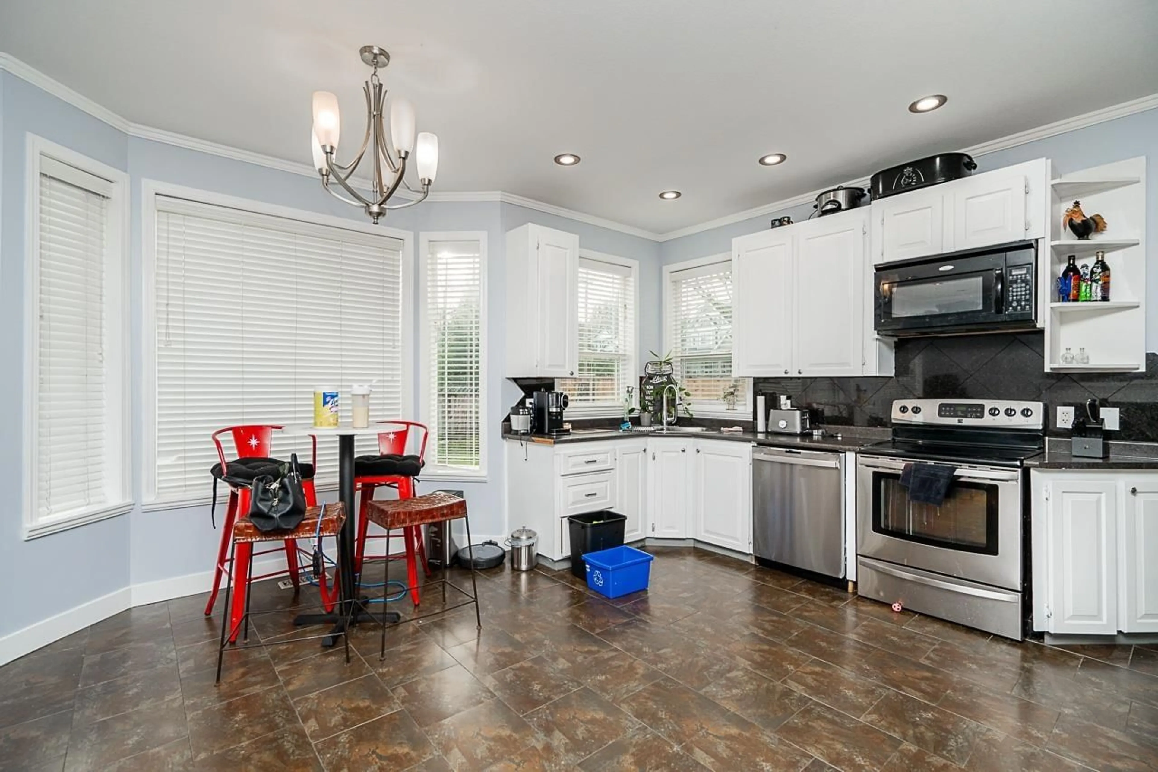 Open concept kitchen, ceramic/tile floor for 16808 61 AVENUE, Surrey British Columbia V3S8X8