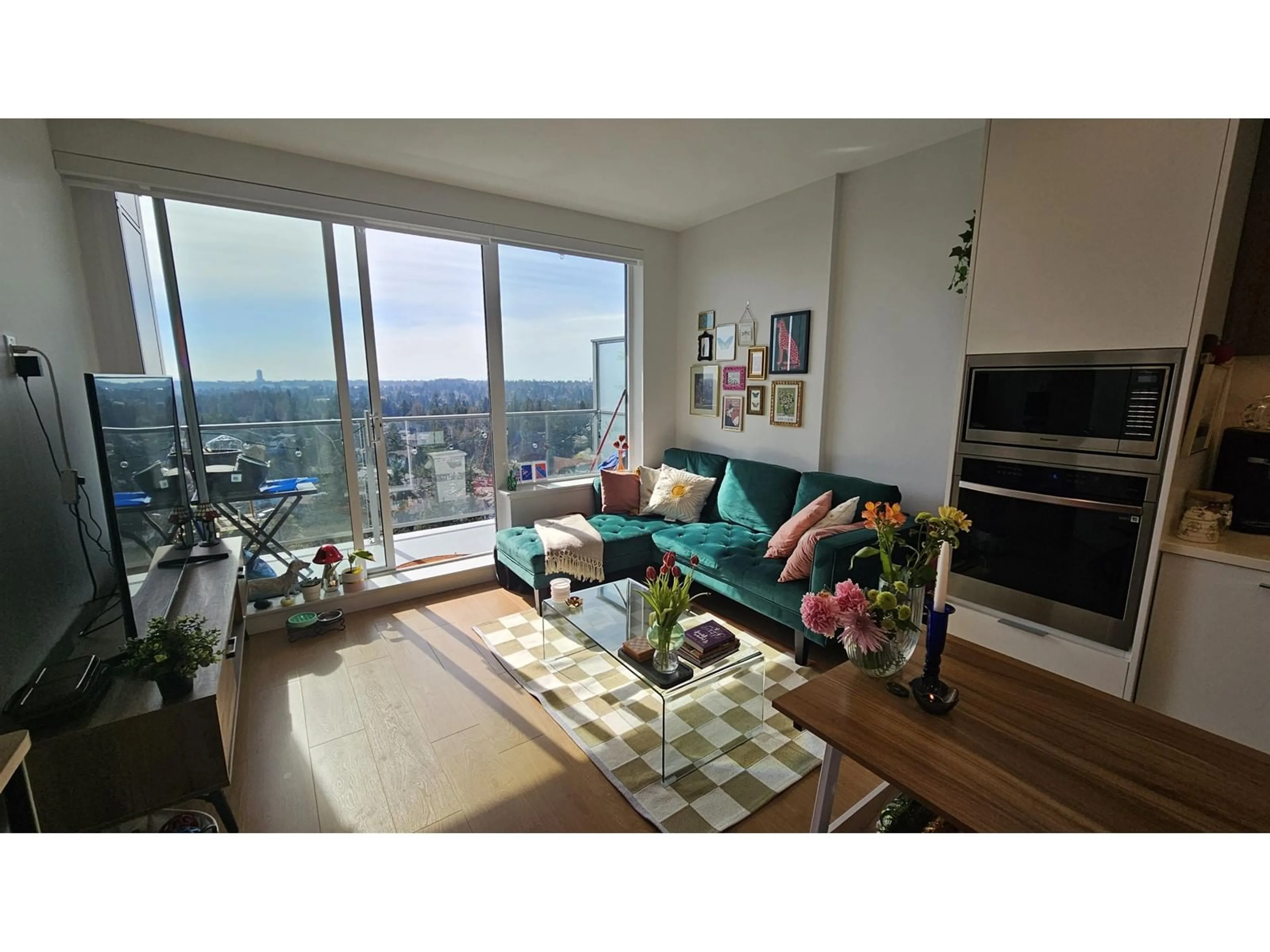 Living room with furniture, wood/laminate floor for 1705 13359 OLD YALE ROAD, Surrey British Columbia V3T3C6