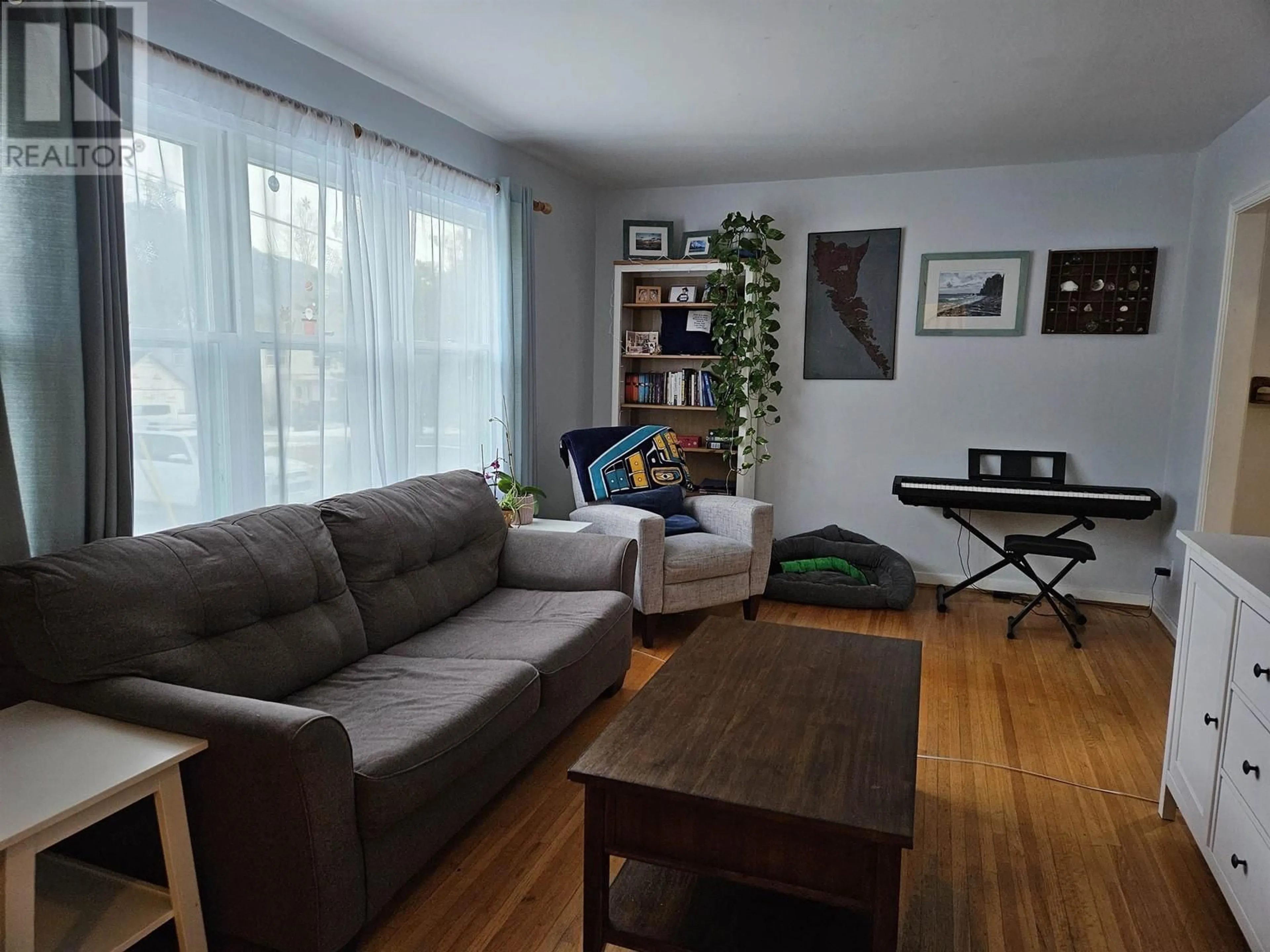 Living room with furniture, wood/laminate floor for 2263 HEMLOCK STREET, Terrace British Columbia V8G5B2