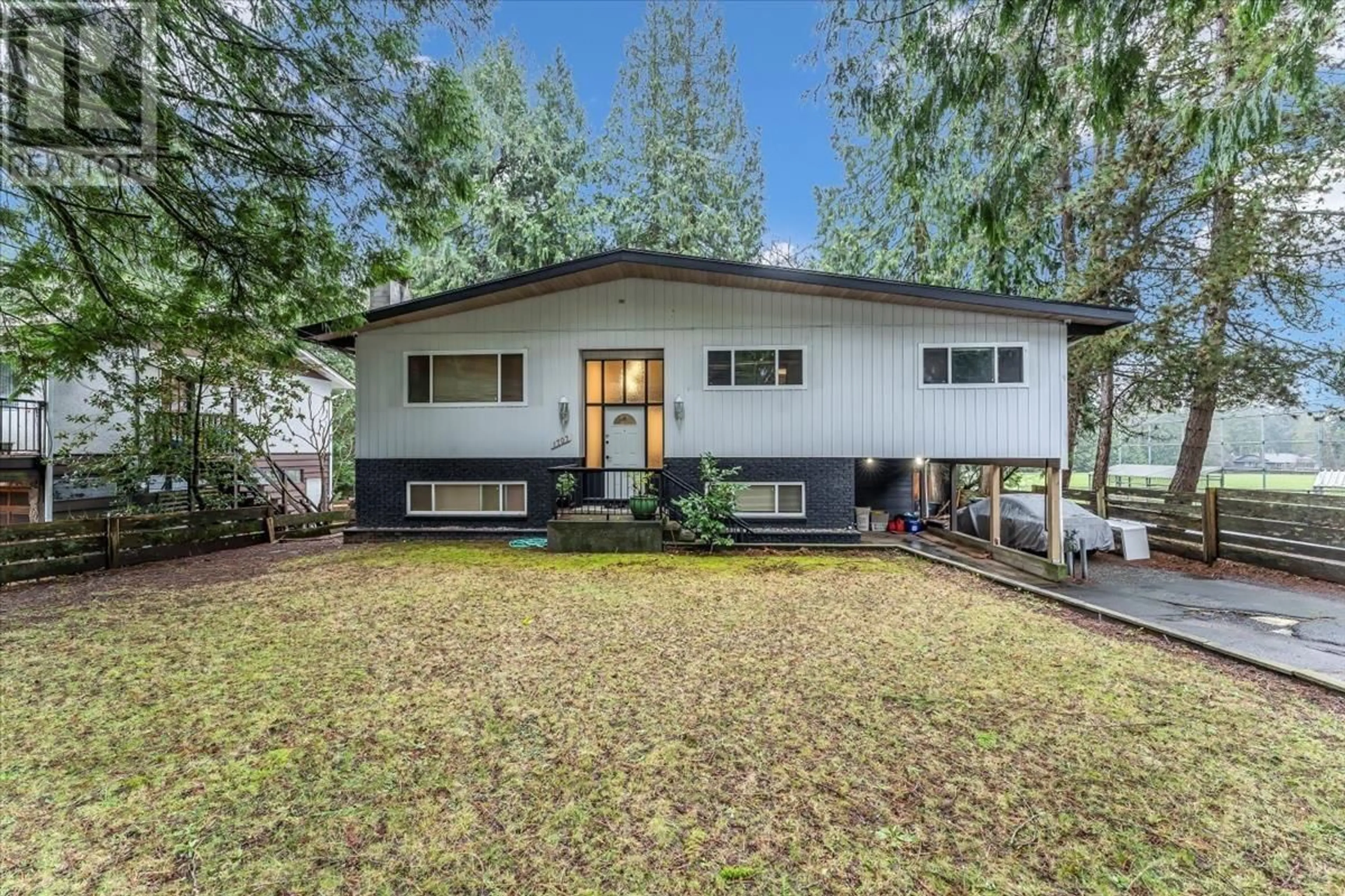 Home with vinyl exterior material, street for 1707 DEMPSEY ROAD, North Vancouver British Columbia V7K1T2