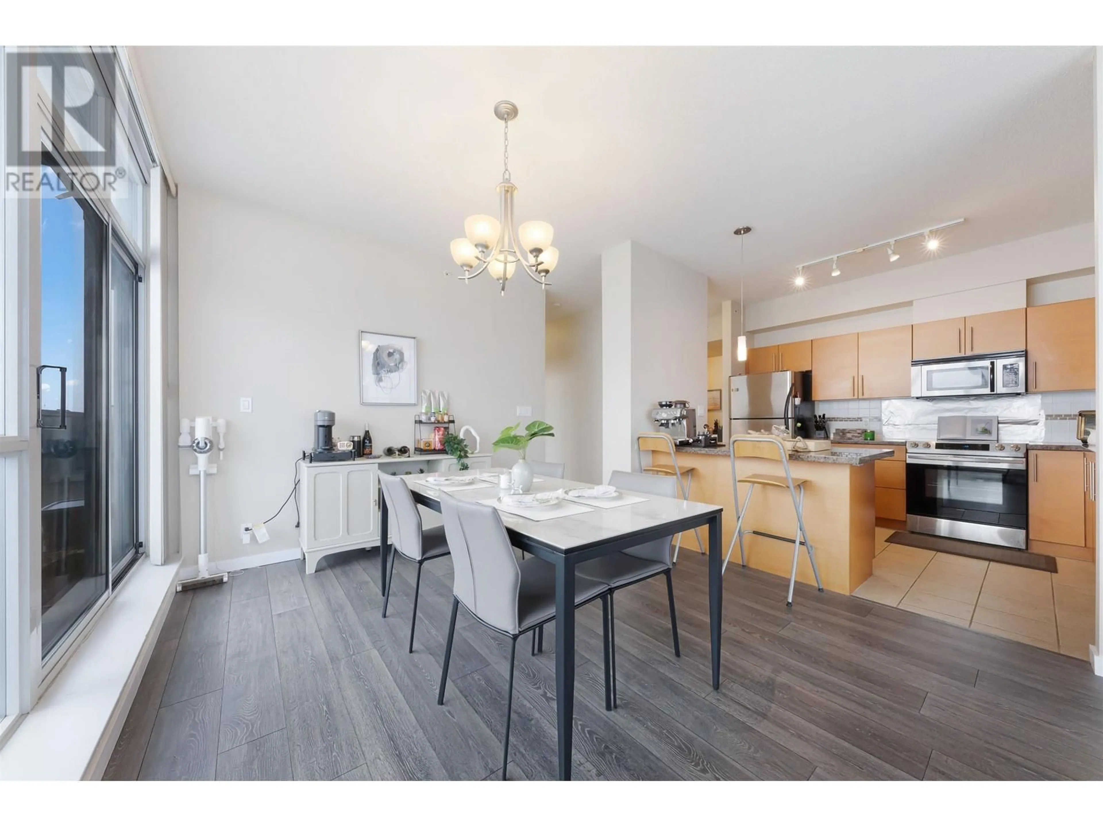 Open concept kitchen, wood/laminate floor for 3002 2225 HOLDOM AVENUE, Burnaby British Columbia V5B0A1