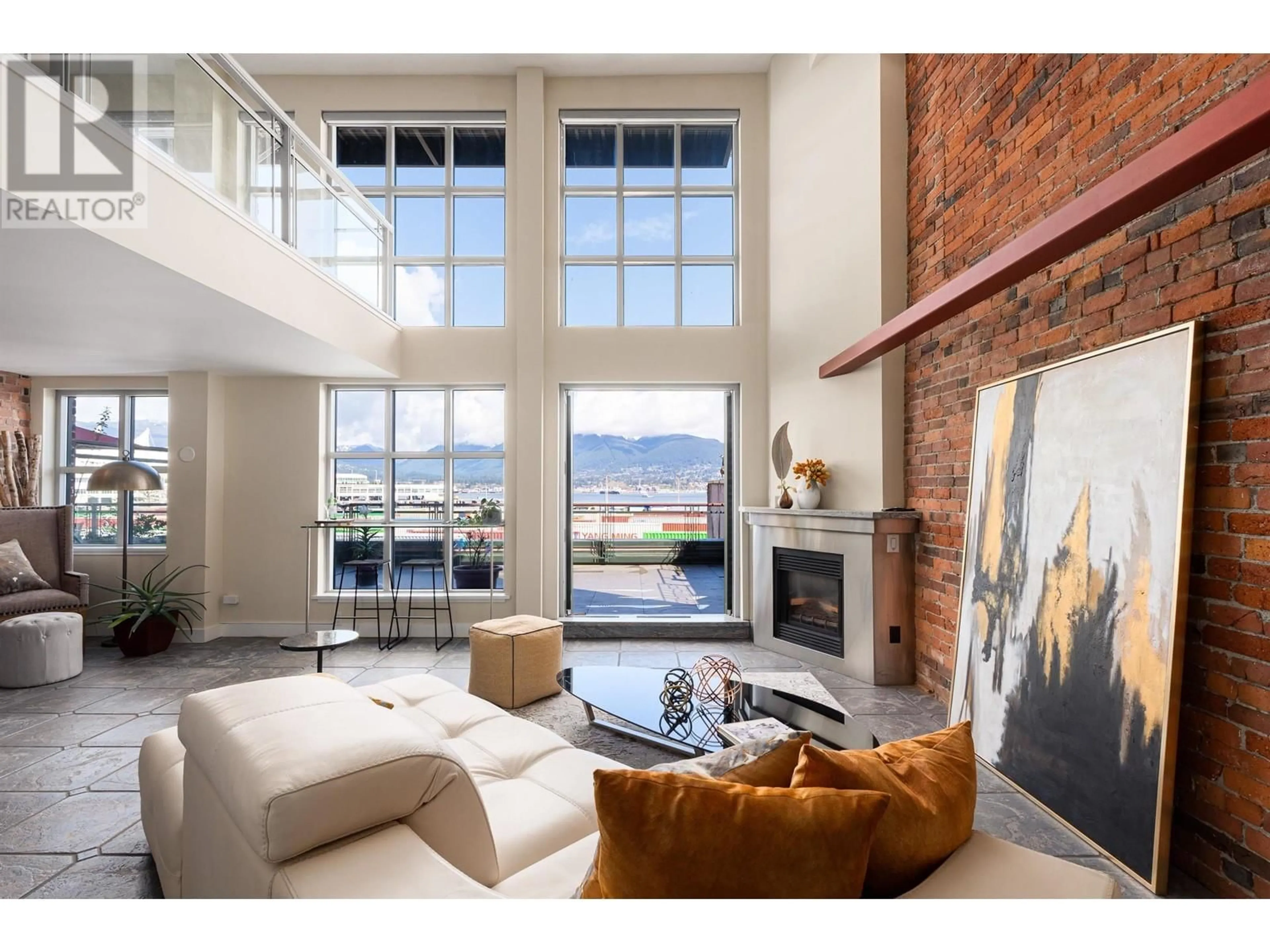 Living room with furniture, ceramic/tile floor for 302 141 WATER STREET, Vancouver British Columbia V6B1A7