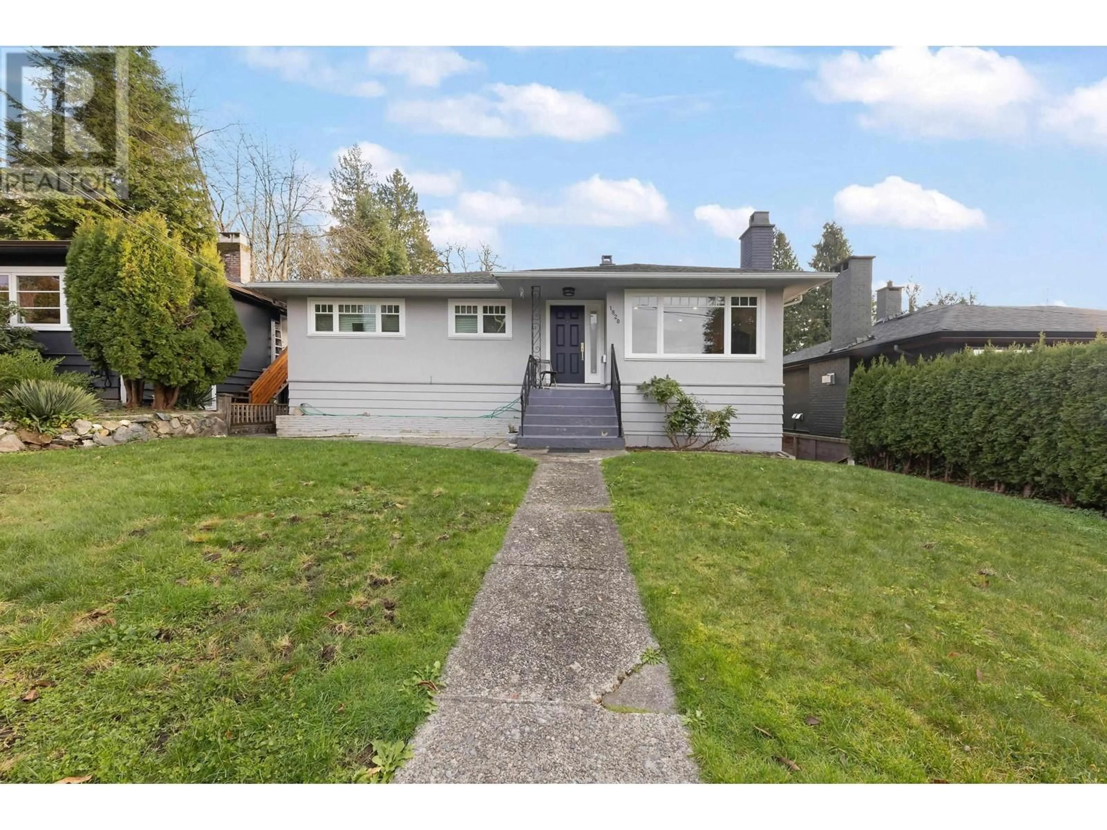 Home with vinyl exterior material, street for 1820 LARSON ROAD, North Vancouver British Columbia V7M2Z6