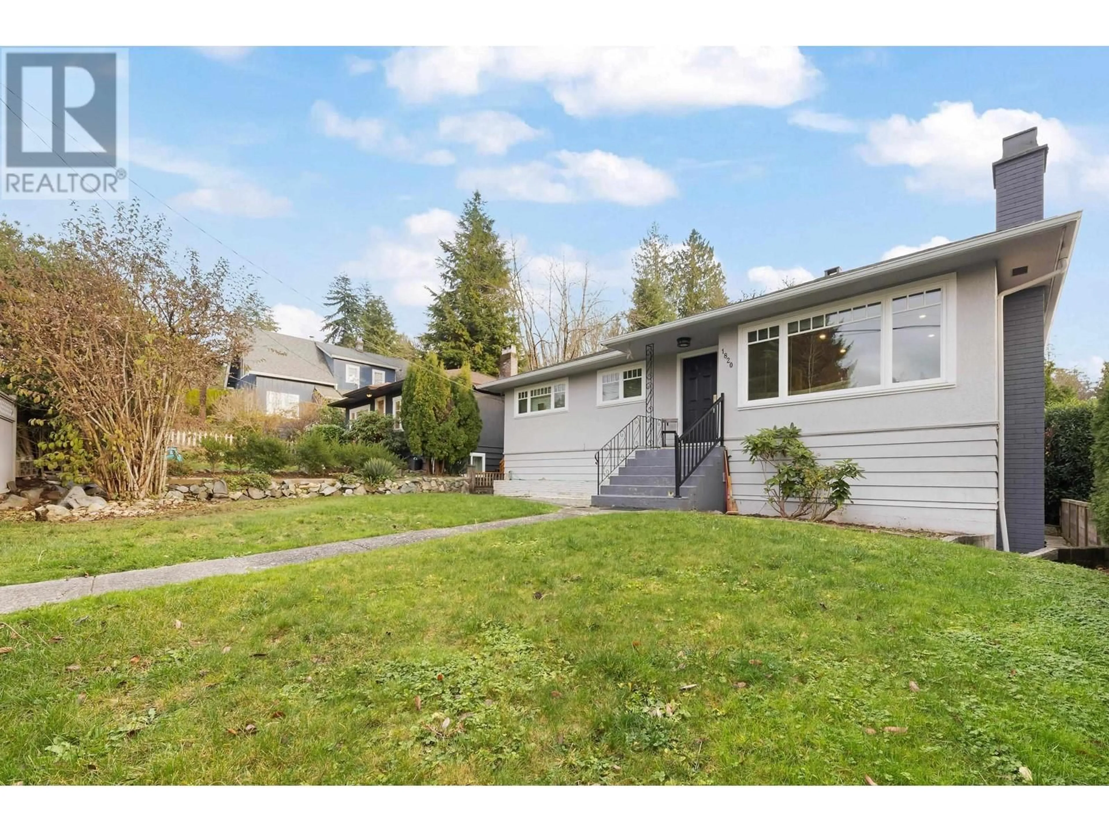 Home with vinyl exterior material, street for 1820 LARSON ROAD, North Vancouver British Columbia V7M2Z6