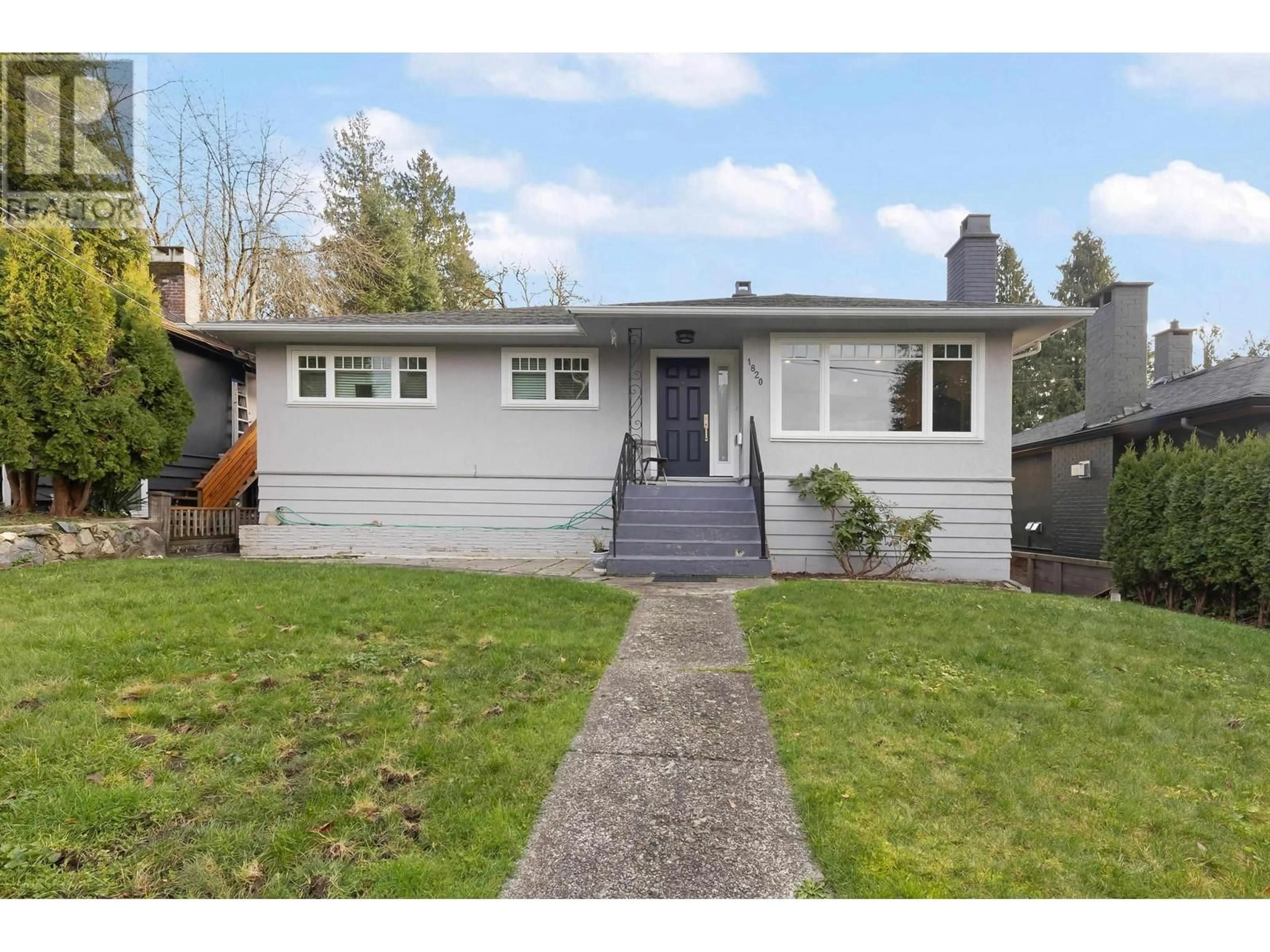 Home with vinyl exterior material, street for 1820 LARSON ROAD, North Vancouver British Columbia V7M2Z6