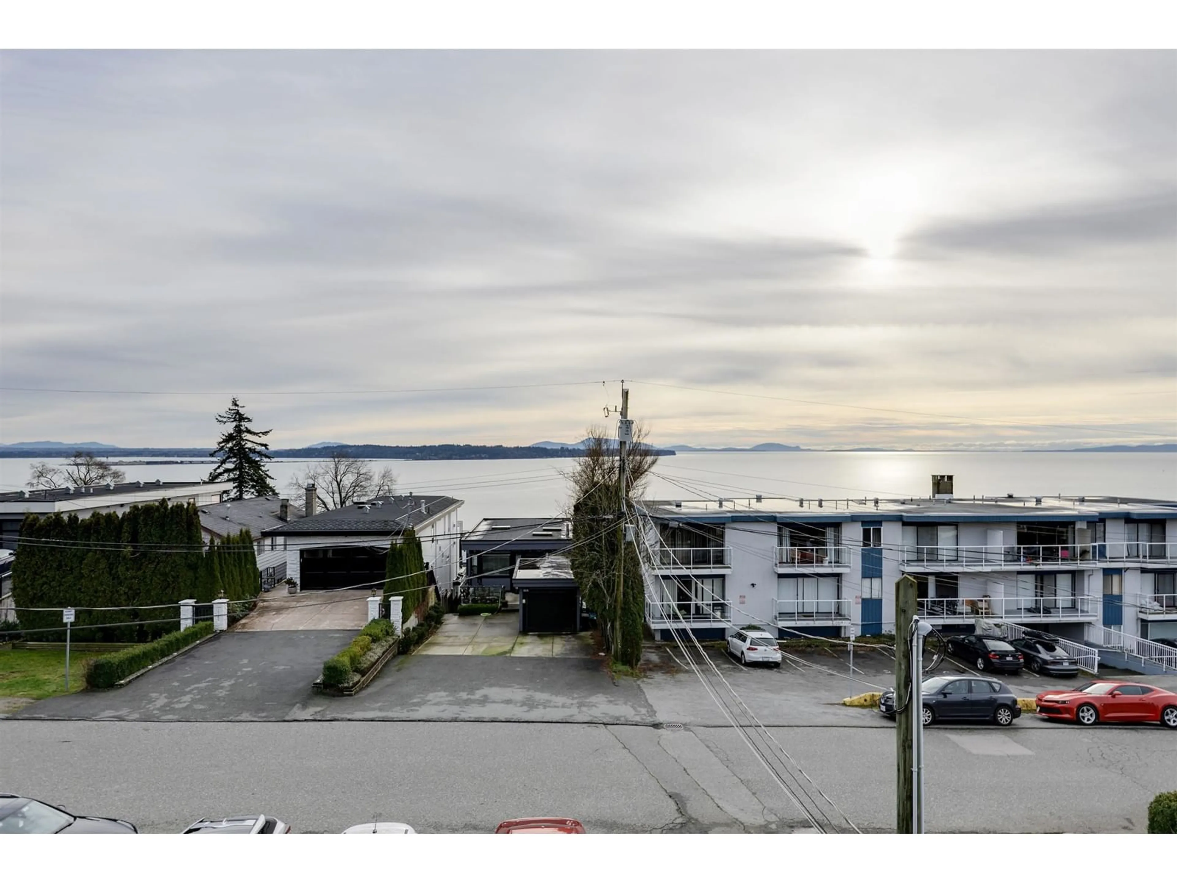 A pic from outside/outdoor area/front of a property/back of a property/a pic from drone, water/lake/river/ocean view for 15173 ROYAL AVENUE, White Rock British Columbia V4B1M2