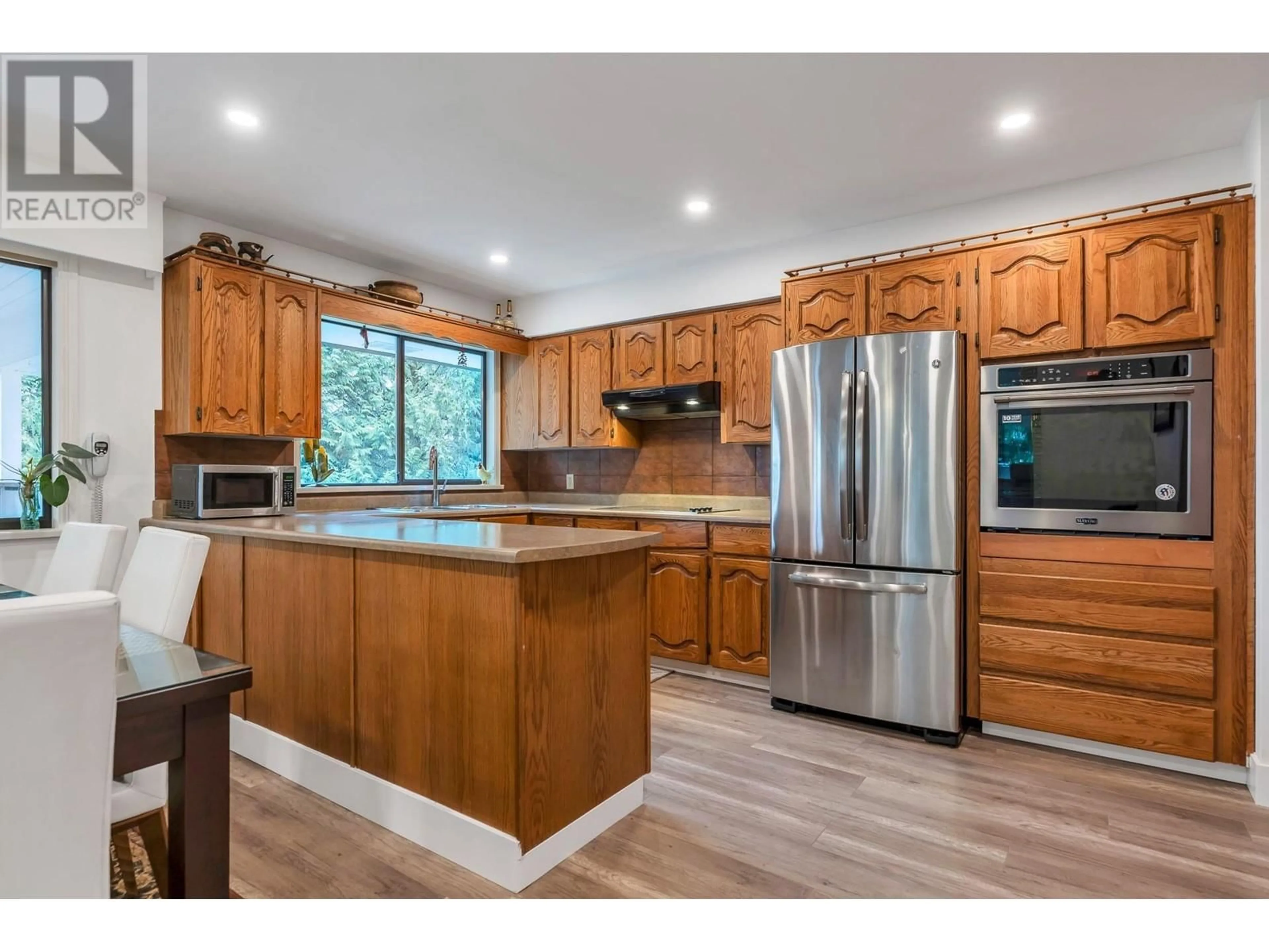 Open concept kitchen, wood/laminate floor for 3775 LINCOLN AVENUE, Coquitlam British Columbia V3E3H8