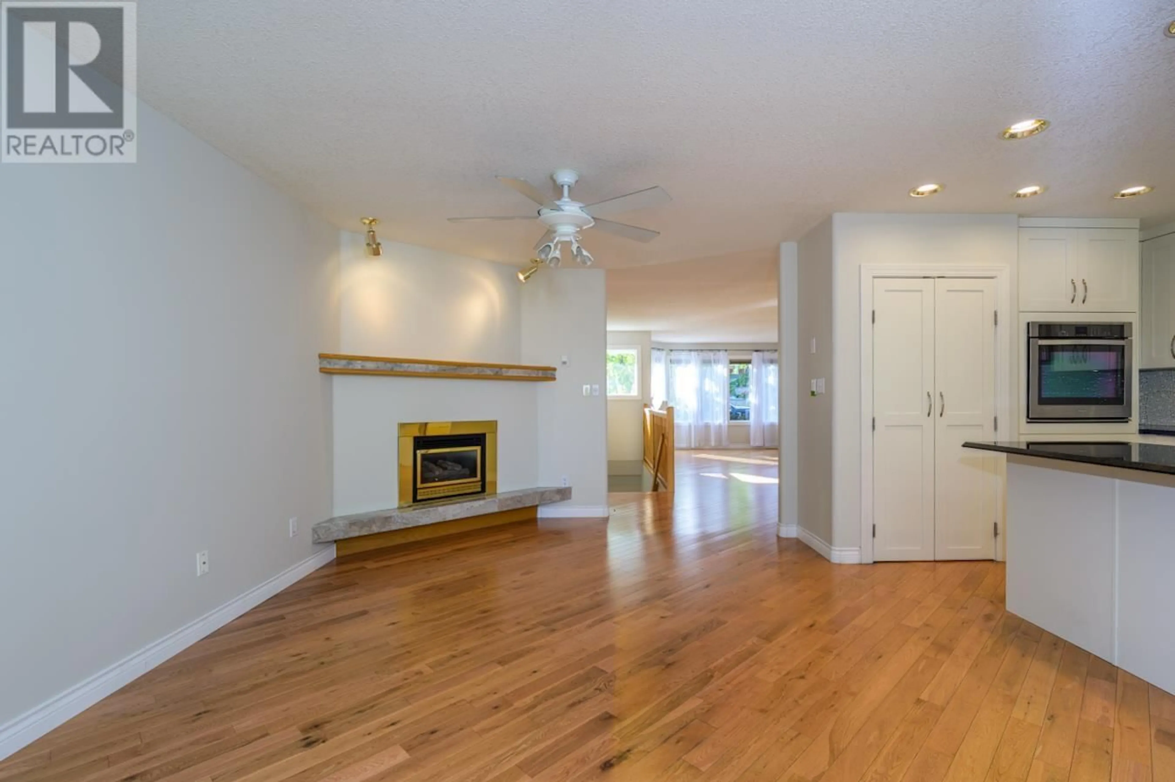 Living room with furniture, wood/laminate floor for 3166 WALLACE CRESCENT, Prince George British Columbia V2K3R6