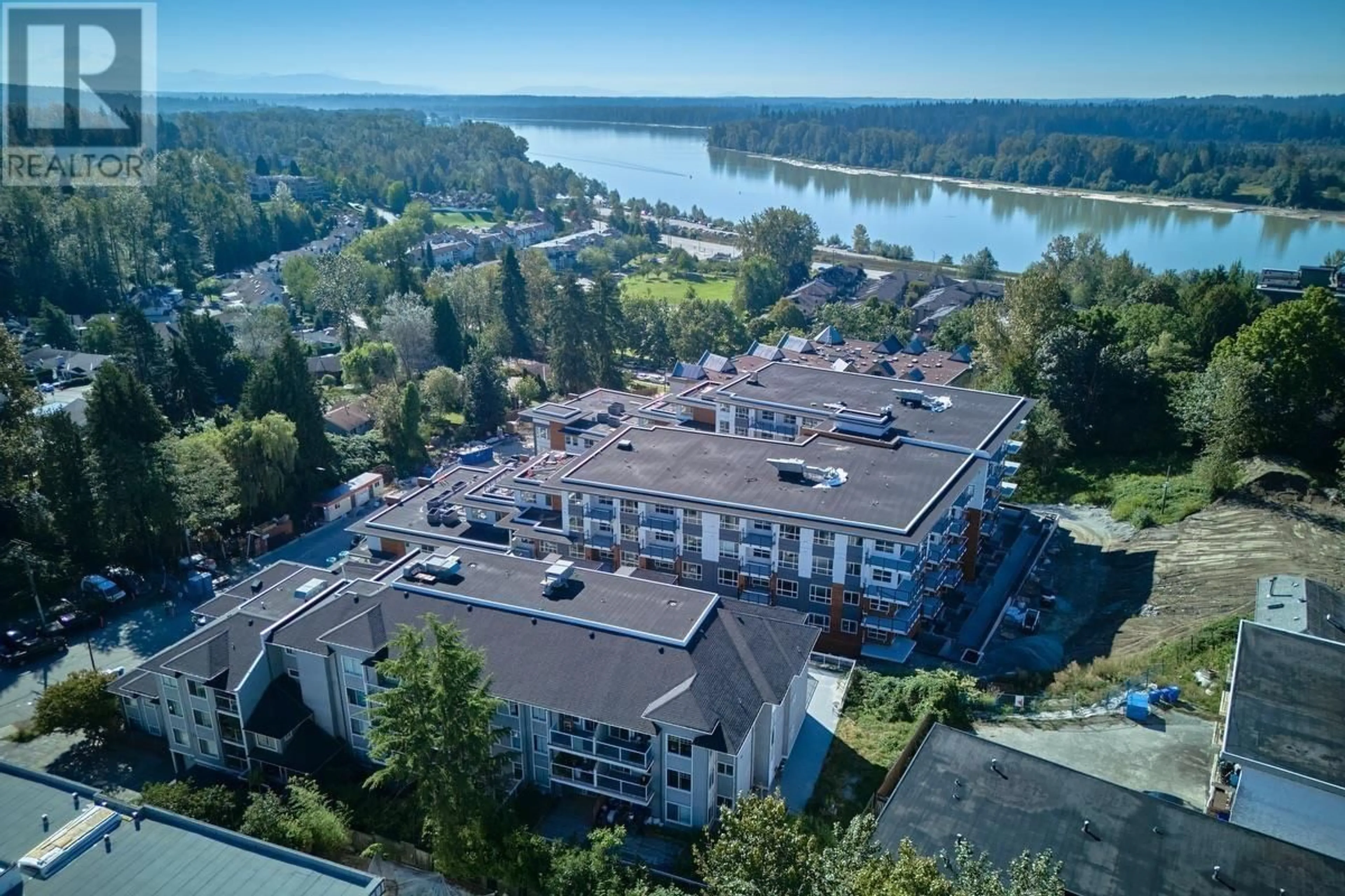 A pic from outside/outdoor area/front of a property/back of a property/a pic from drone, water/lake/river/ocean view for 507 11671 FRASER STREET, Maple Ridge British Columbia V2X6C4