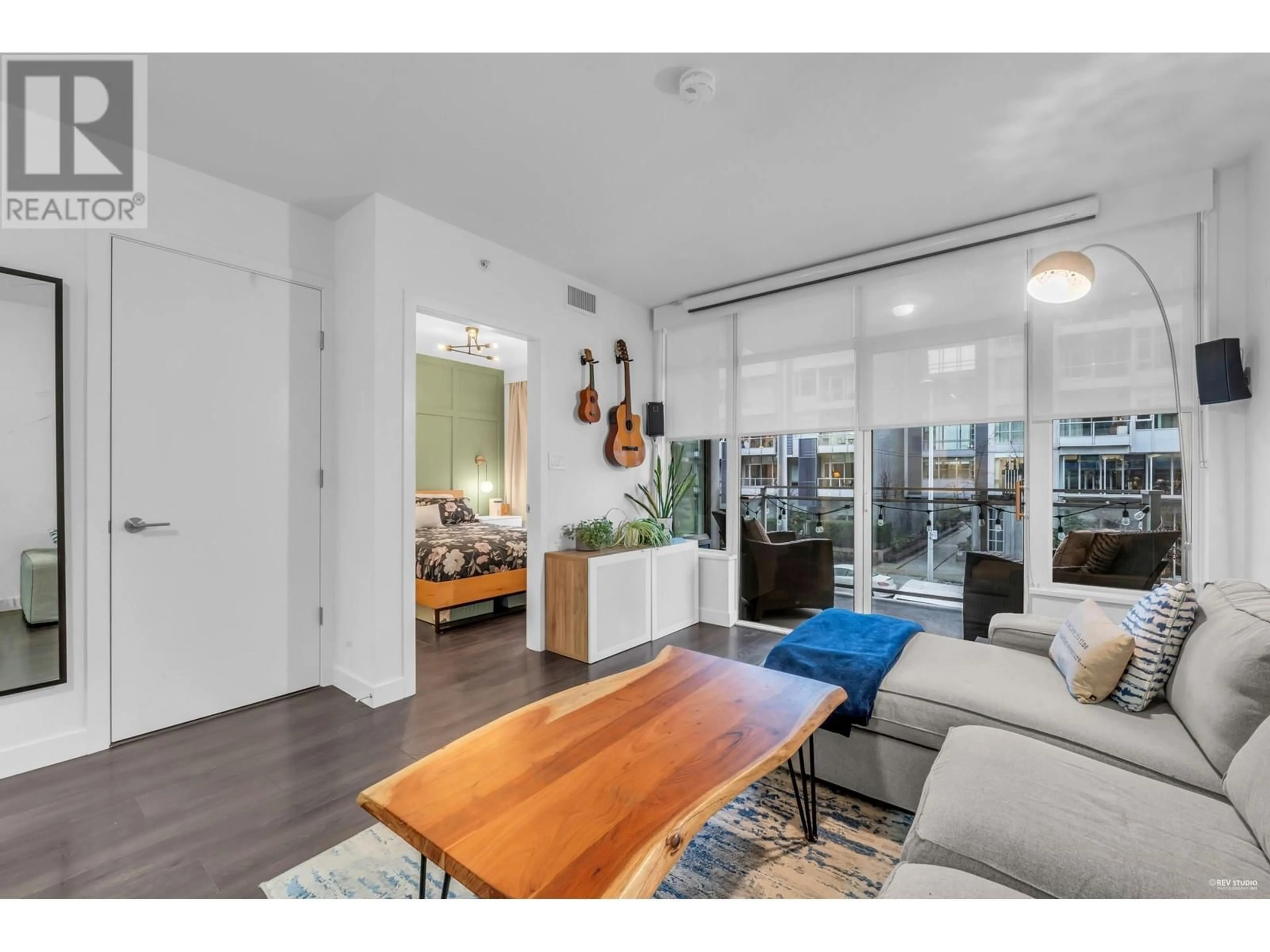 Living room with furniture, wood/laminate floor for 205 - 111 1ST AVENUE, Vancouver British Columbia V6A0E9
