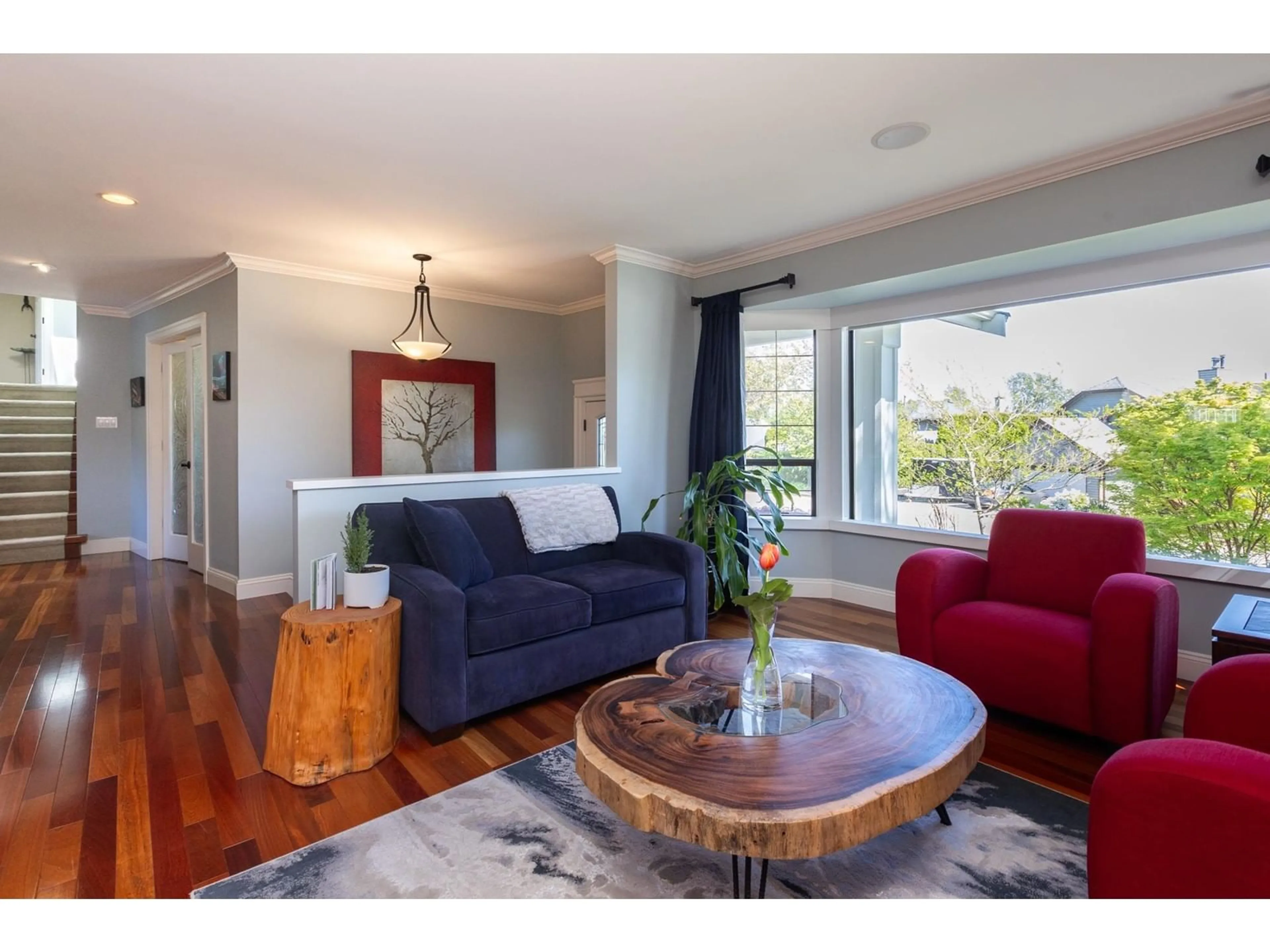 Living room with furniture, wood/laminate floor for 16169 13TH AVENUE, Surrey British Columbia V4A6W3