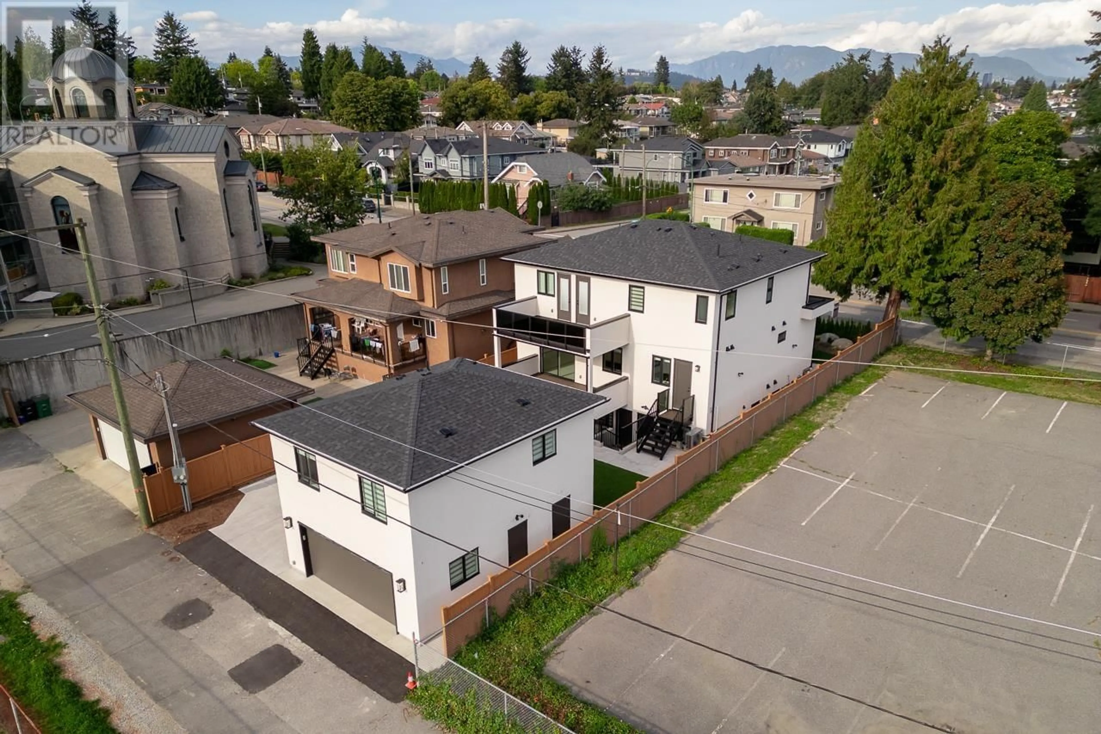 A pic from outside/outdoor area/front of a property/back of a property/a pic from drone, street for 7867 CANADA WAY, Burnaby British Columbia V3N3K8