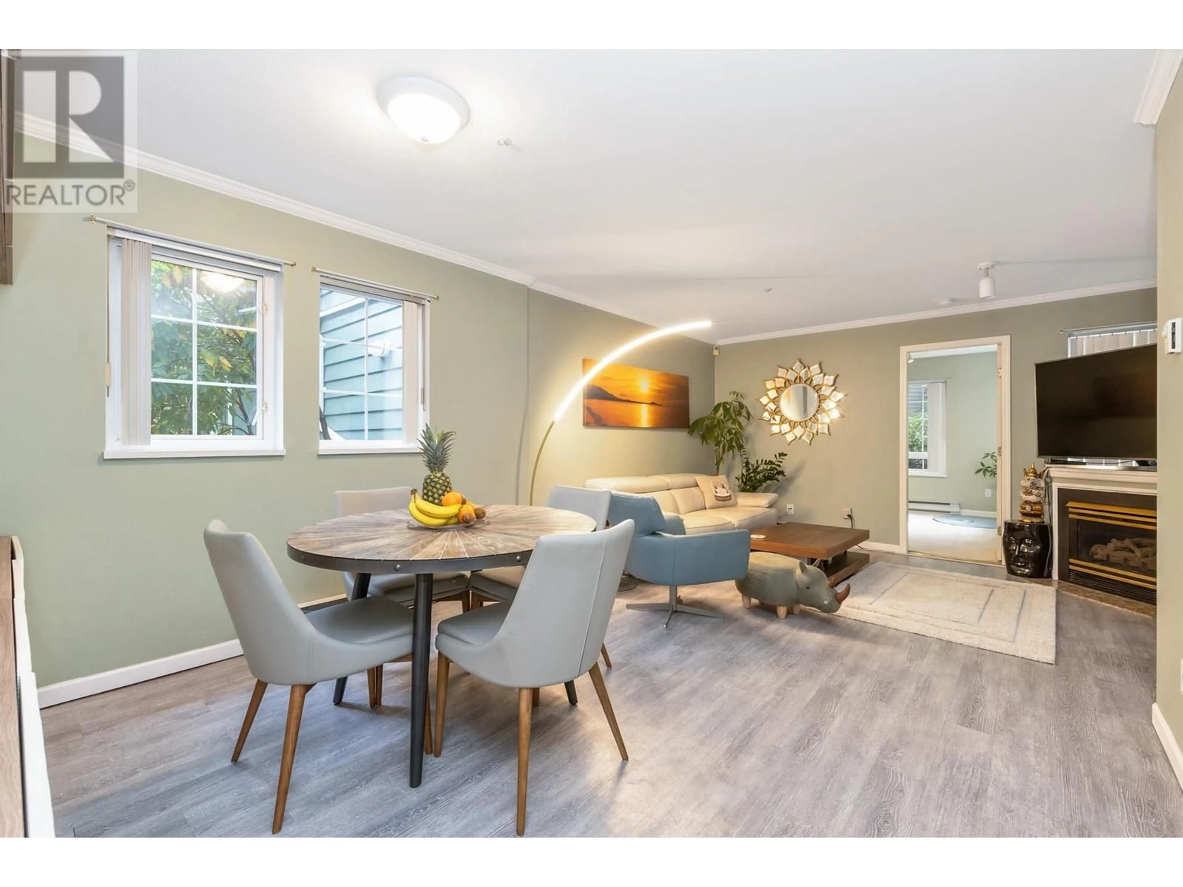 Dining room, wood/laminate floor for 101 1189 WESTWOOD STREET, Coquitlam British Columbia V3B7P5