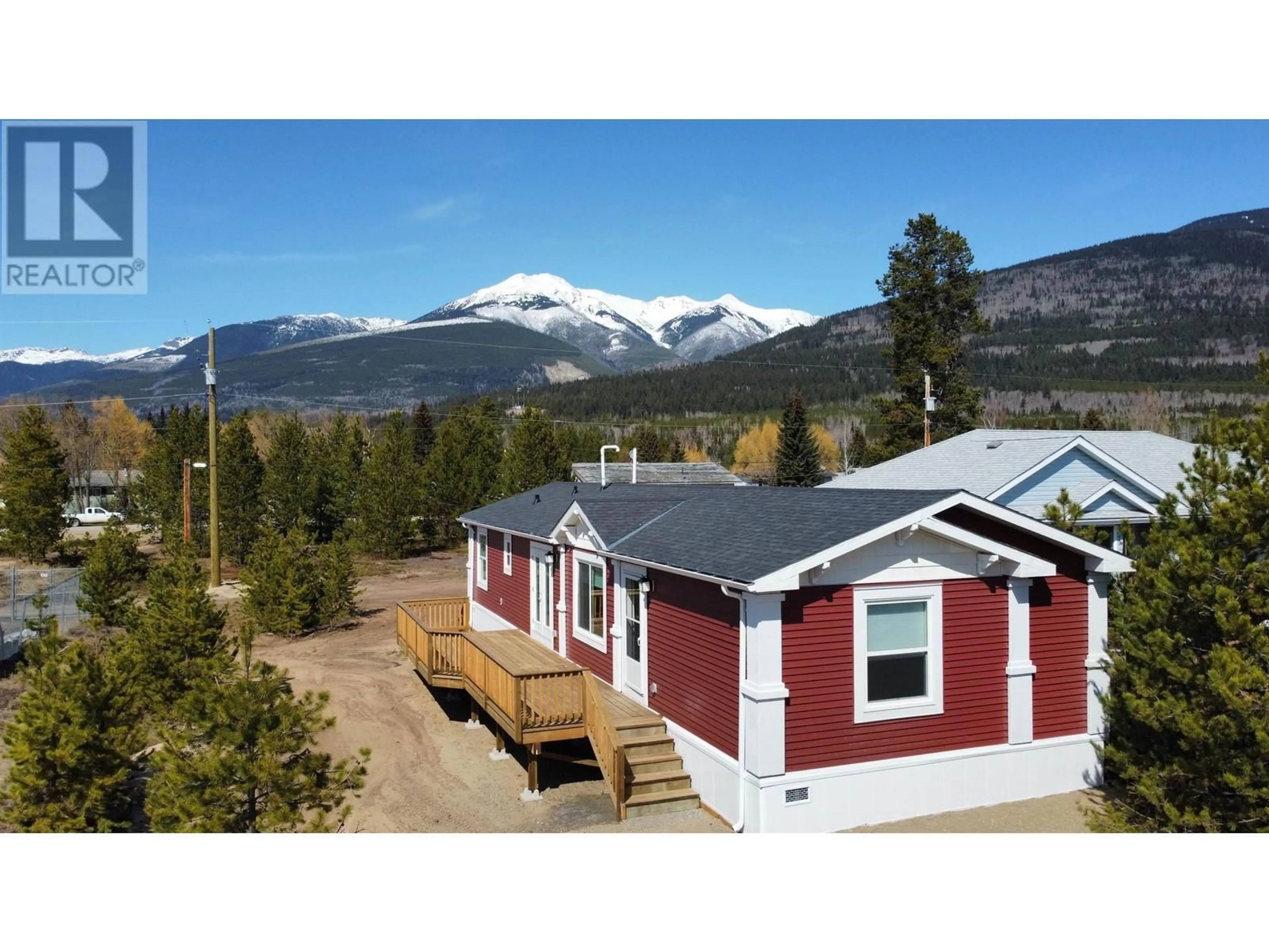 Home with vinyl exterior material, mountain view for 1170 9TH AVENUE, Valemount British Columbia V0E2Z0