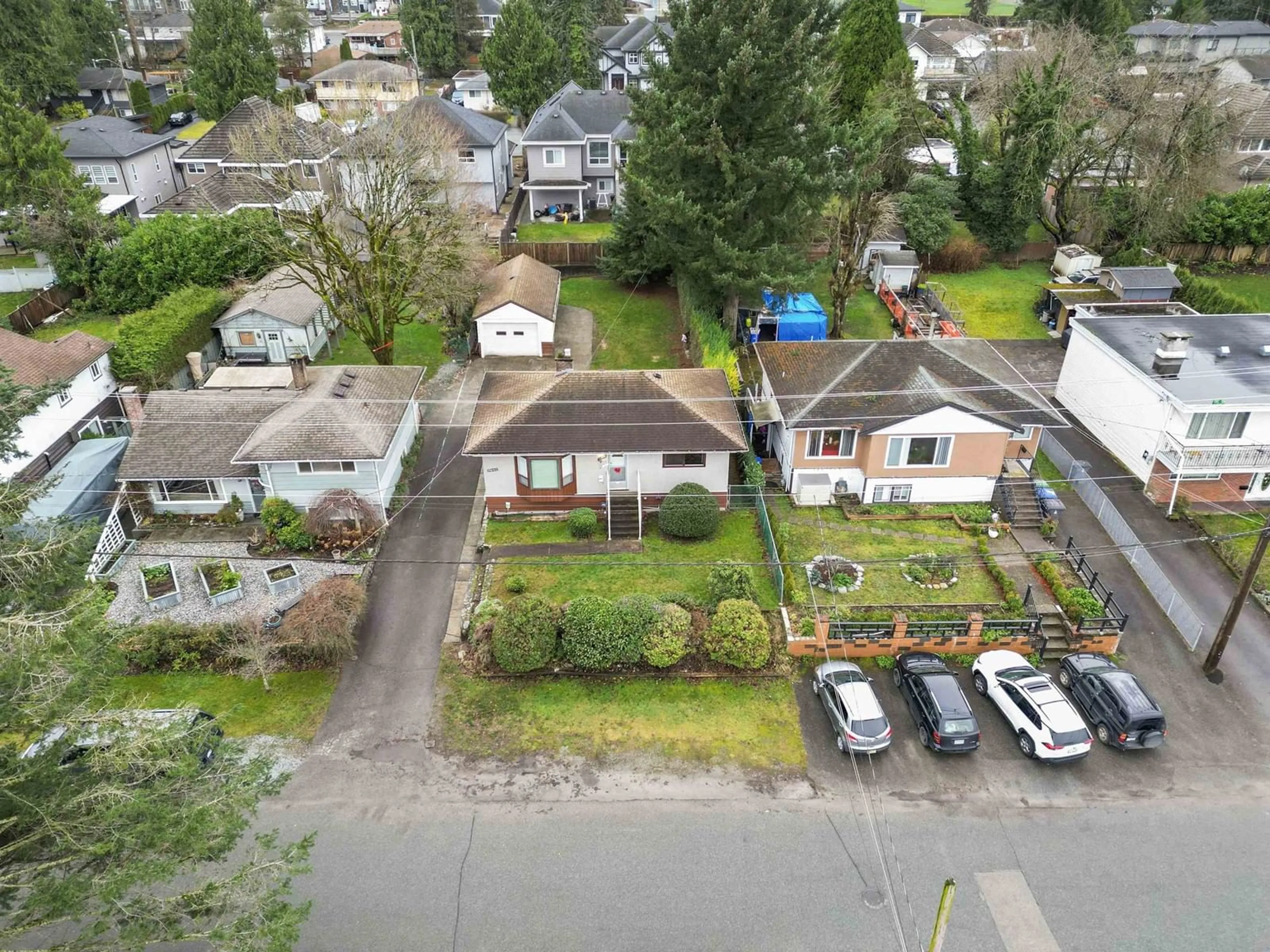 A pic from outside/outdoor area/front of a property/back of a property/a pic from drone, street for 11660 98A AVENUE, Surrey British Columbia V3V2K9