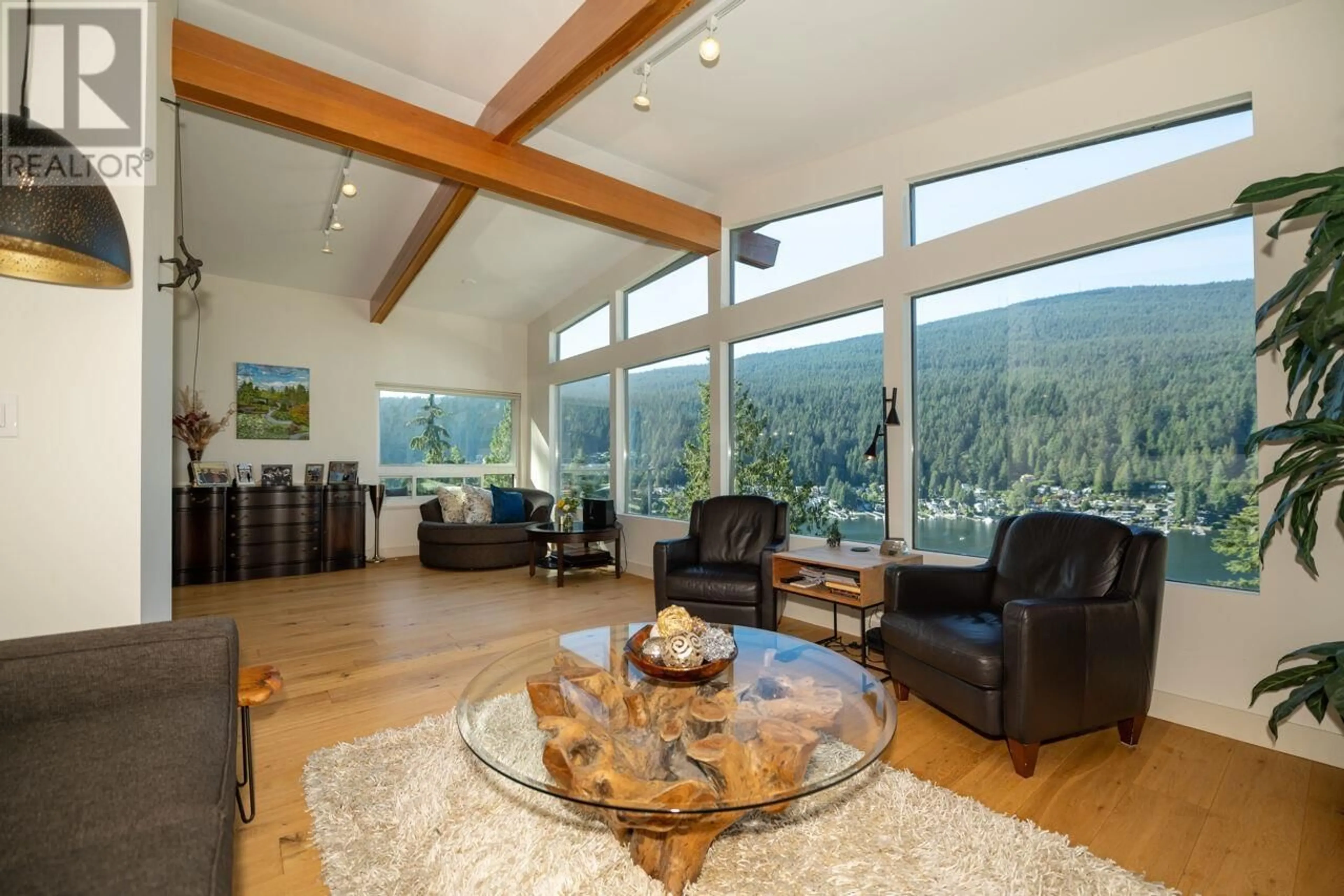 Living room with furniture, wood/laminate floor for 4682 EASTRIDGE ROAD, North Vancouver British Columbia V7G1K4