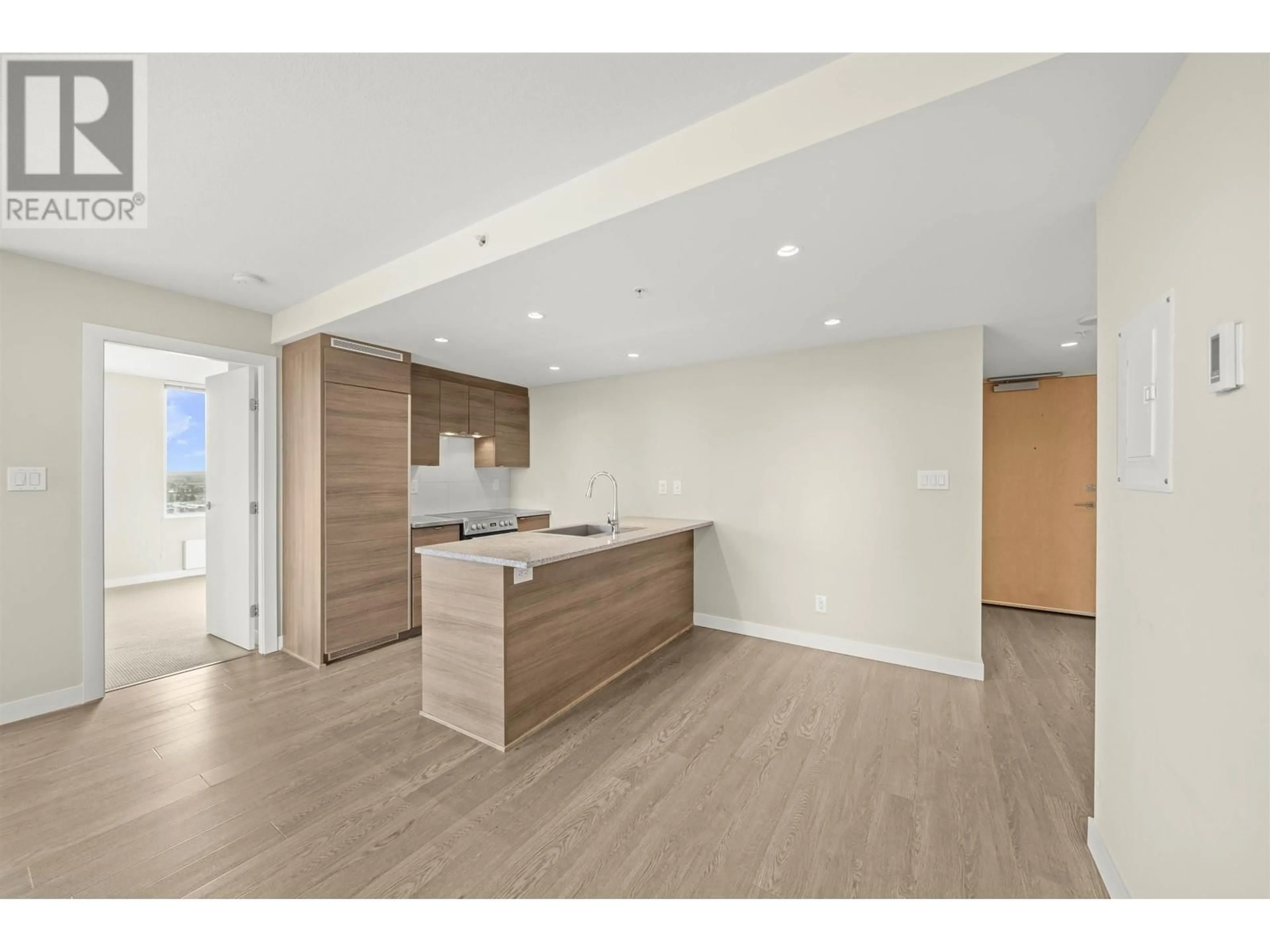 Open concept kitchen, wood/laminate floor for 1607 488 SW MARINE DRIVE, Vancouver British Columbia V5X0C6