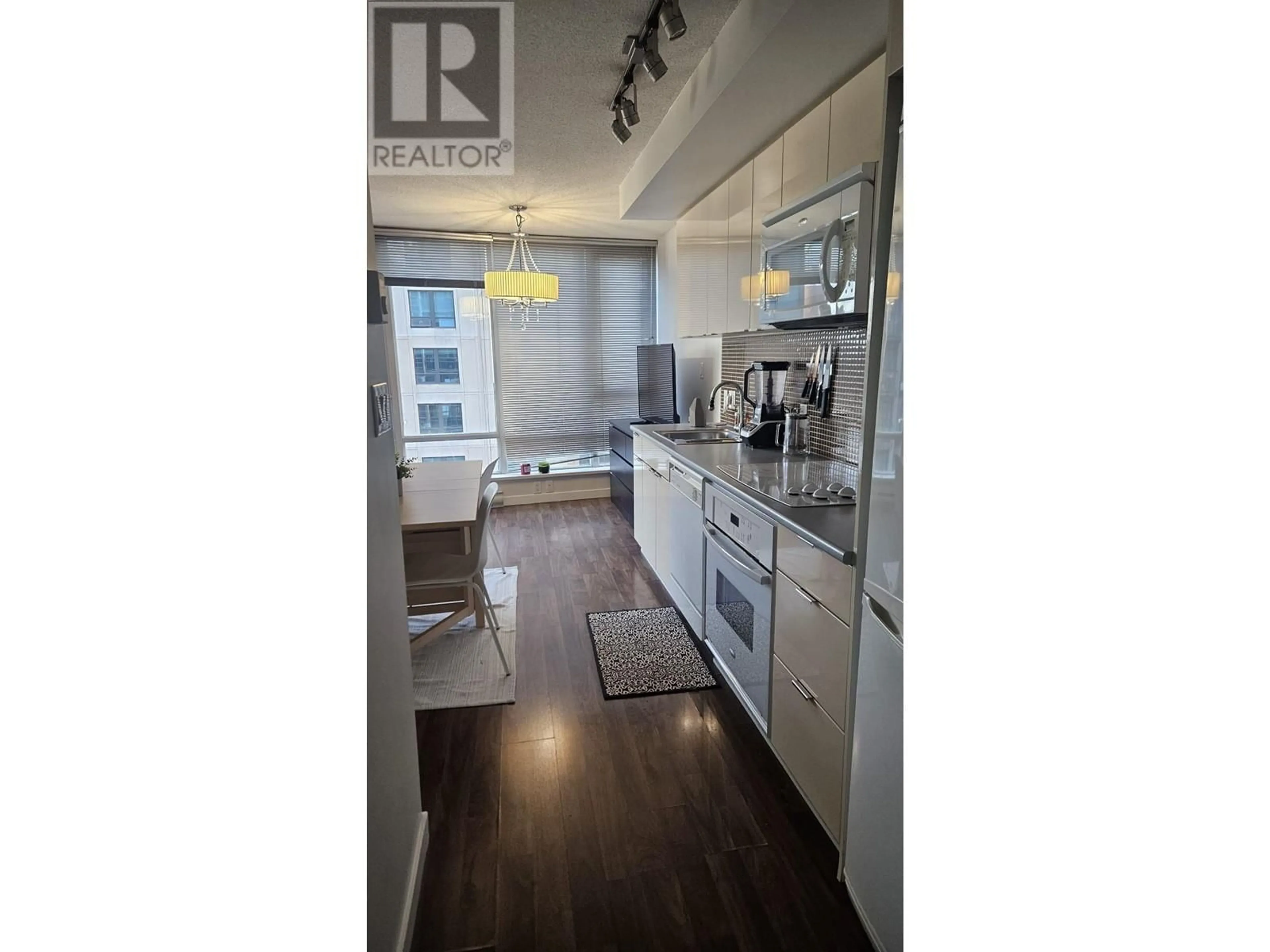 Open concept kitchen, wood/laminate floor for 1606 233 ROBSON STREET, Vancouver British Columbia V6B0E8