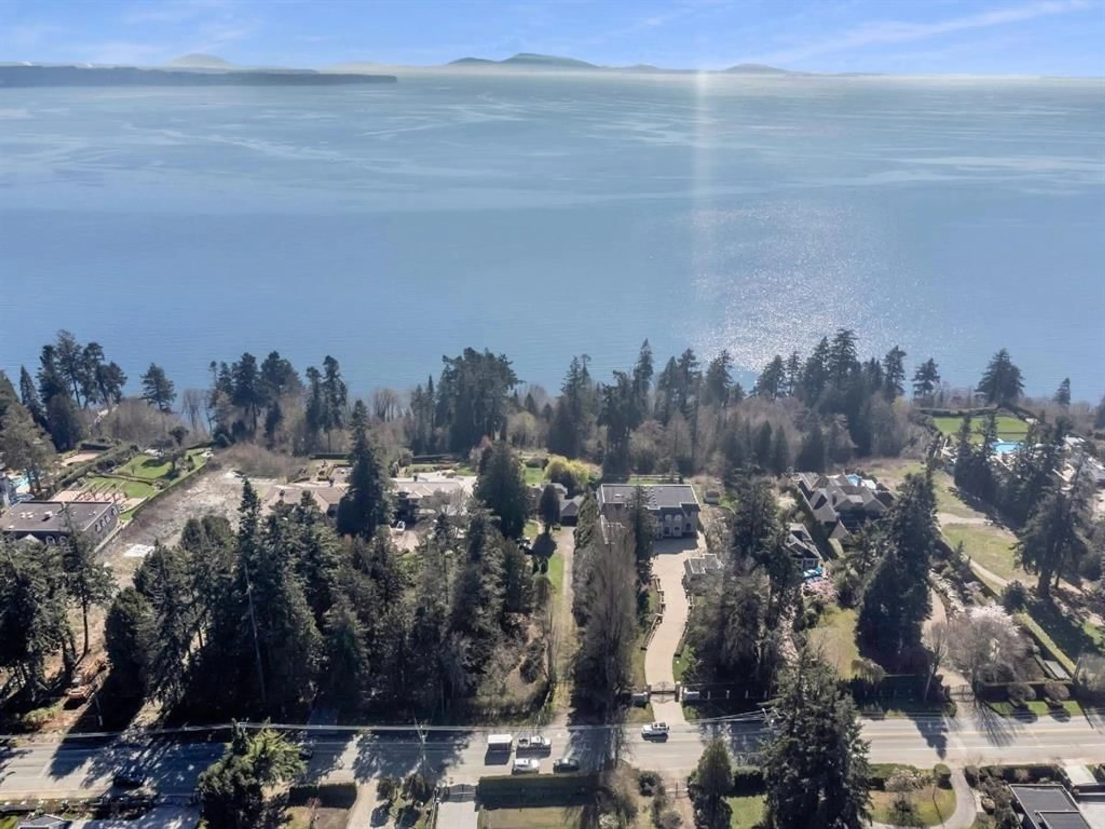 A pic from outside/outdoor area/front of a property/back of a property/a pic from drone, water/lake/river/ocean view for 13706 MARINE, White Rock British Columbia V4B1A4