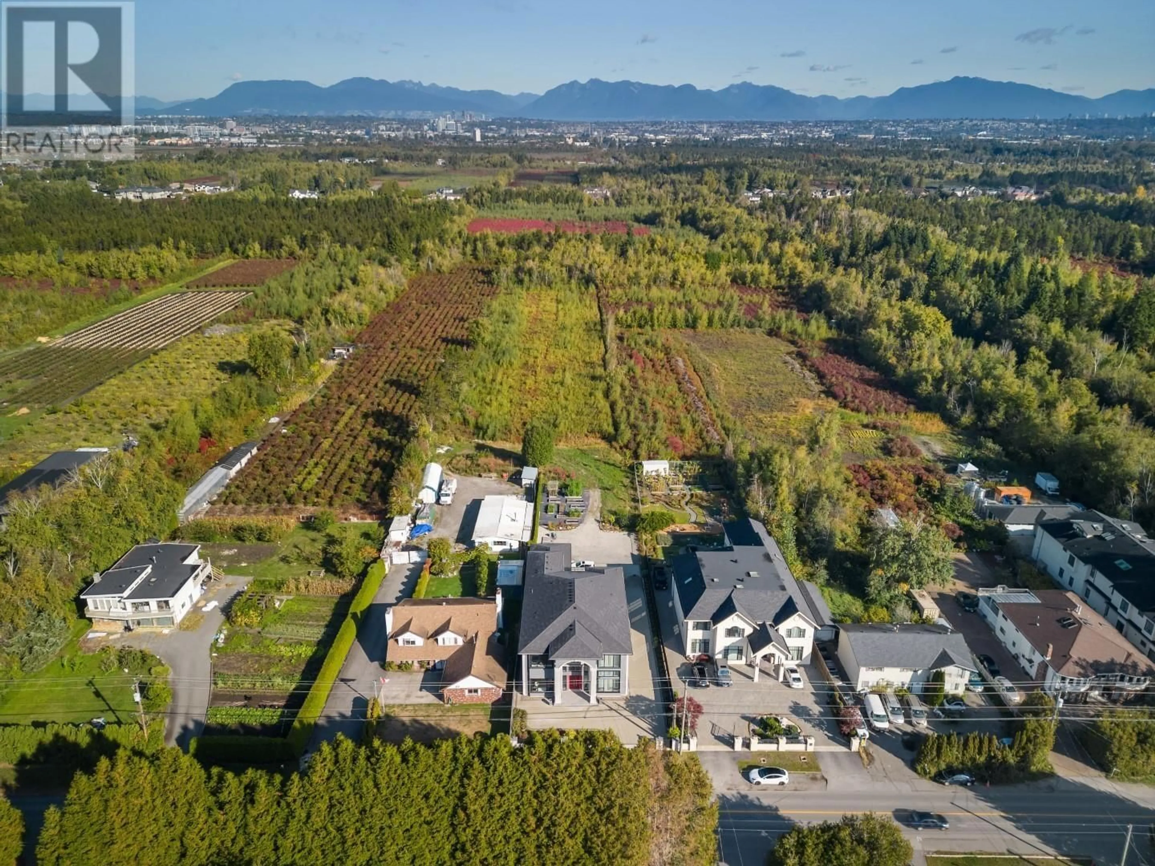 A pic from outside/outdoor area/front of a property/back of a property/a pic from drone, mountain view for 10691 BLUNDELL ROAD, Richmond British Columbia V6Y1L2