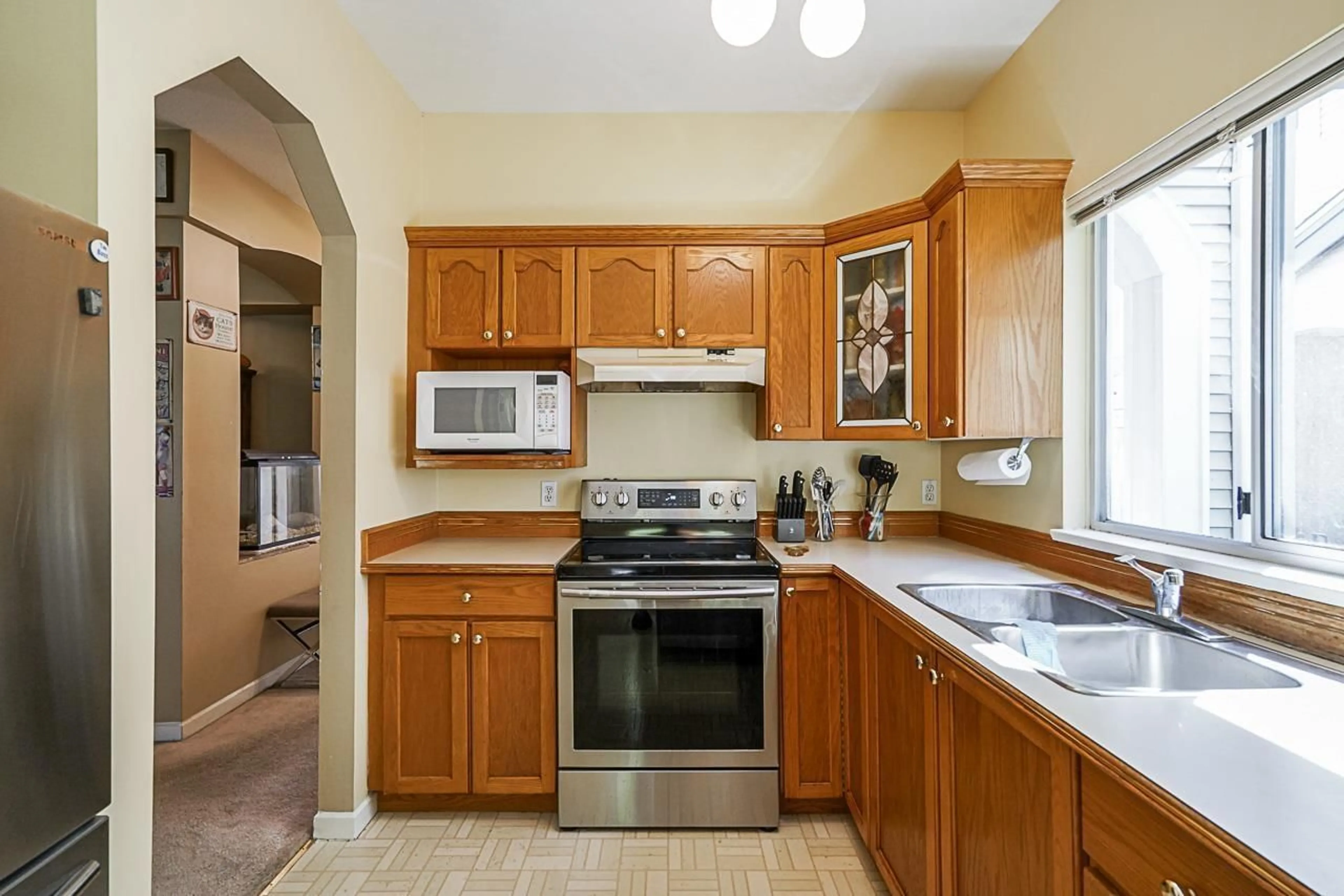 Standard kitchen, ceramic/tile floor for 107 9072 FLEETWOOD WAY, Surrey British Columbia V3R0M6