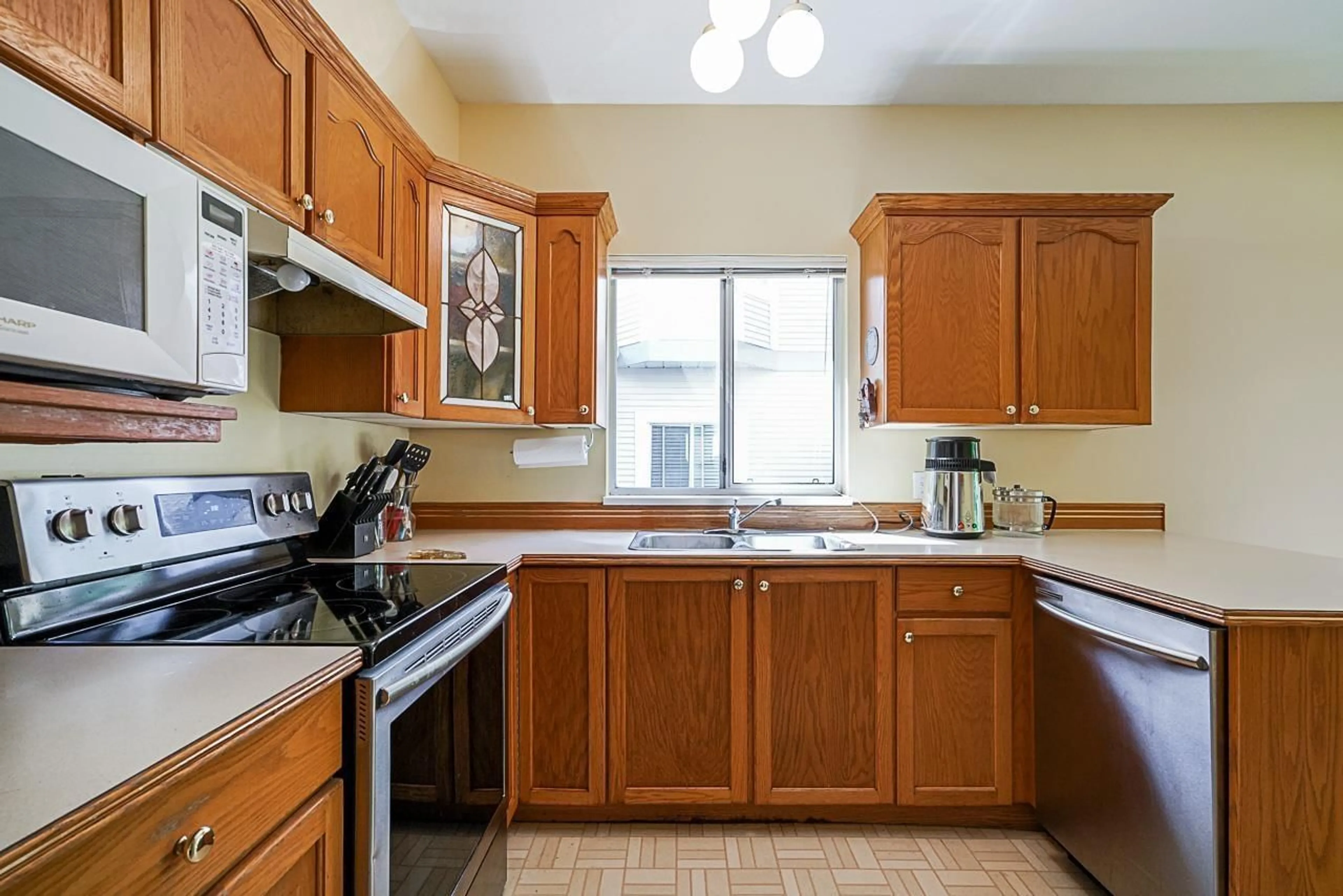 Standard kitchen, unknown for 107 9072 FLEETWOOD WAY, Surrey British Columbia V3R0M6