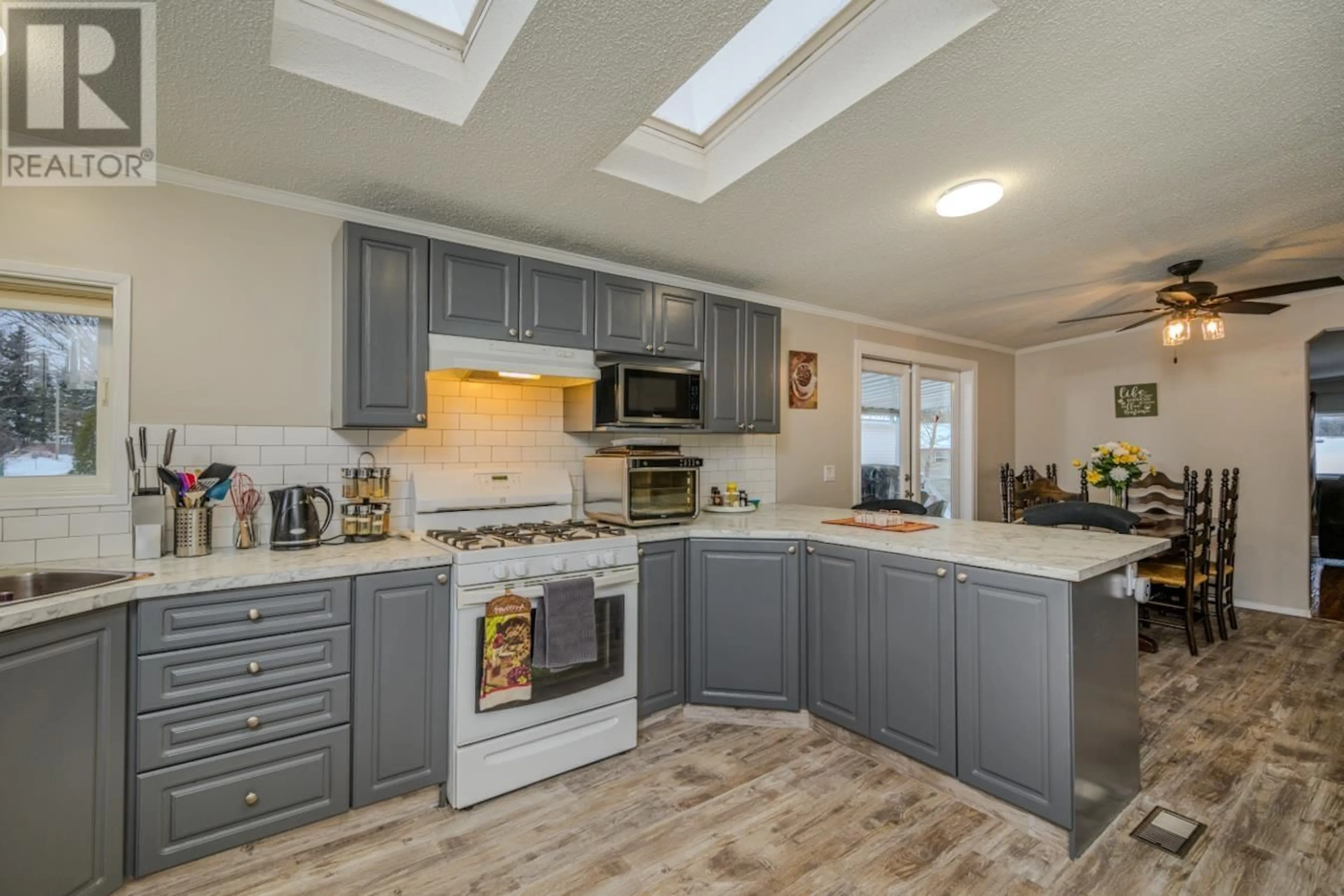 Open concept kitchen, unknown for 3 7100 ALDEEN ROAD, Prince George British Columbia V2N5R5