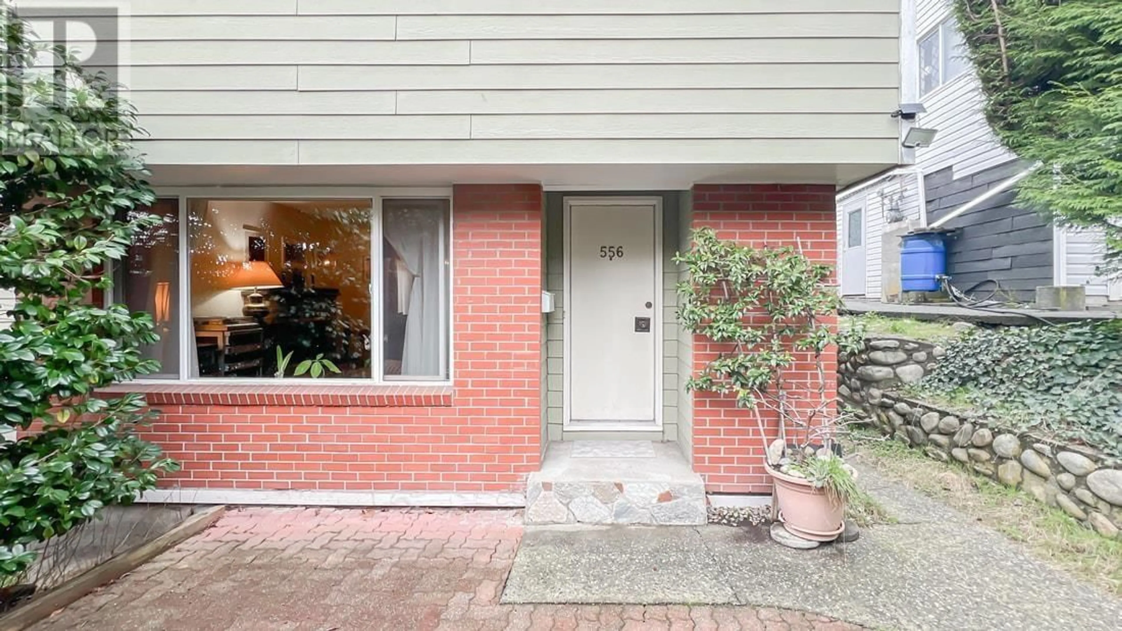 Home with brick exterior material, street for 556 W KEITH ROAD, North Vancouver British Columbia V7M1M4