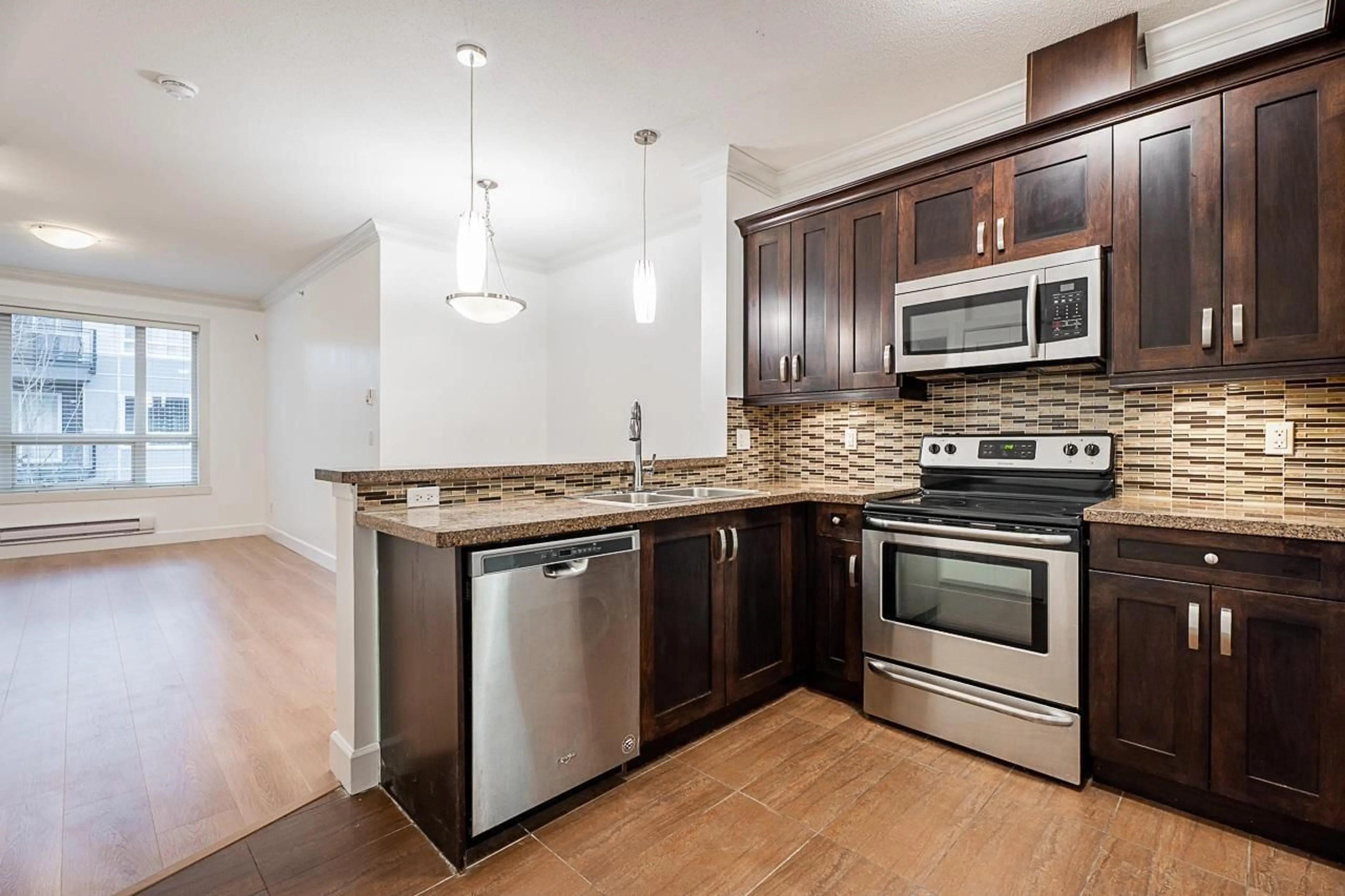 Open concept kitchen, unknown for 506 13897 FRASER HIGHWAY, Surrey British Columbia V3T0G8