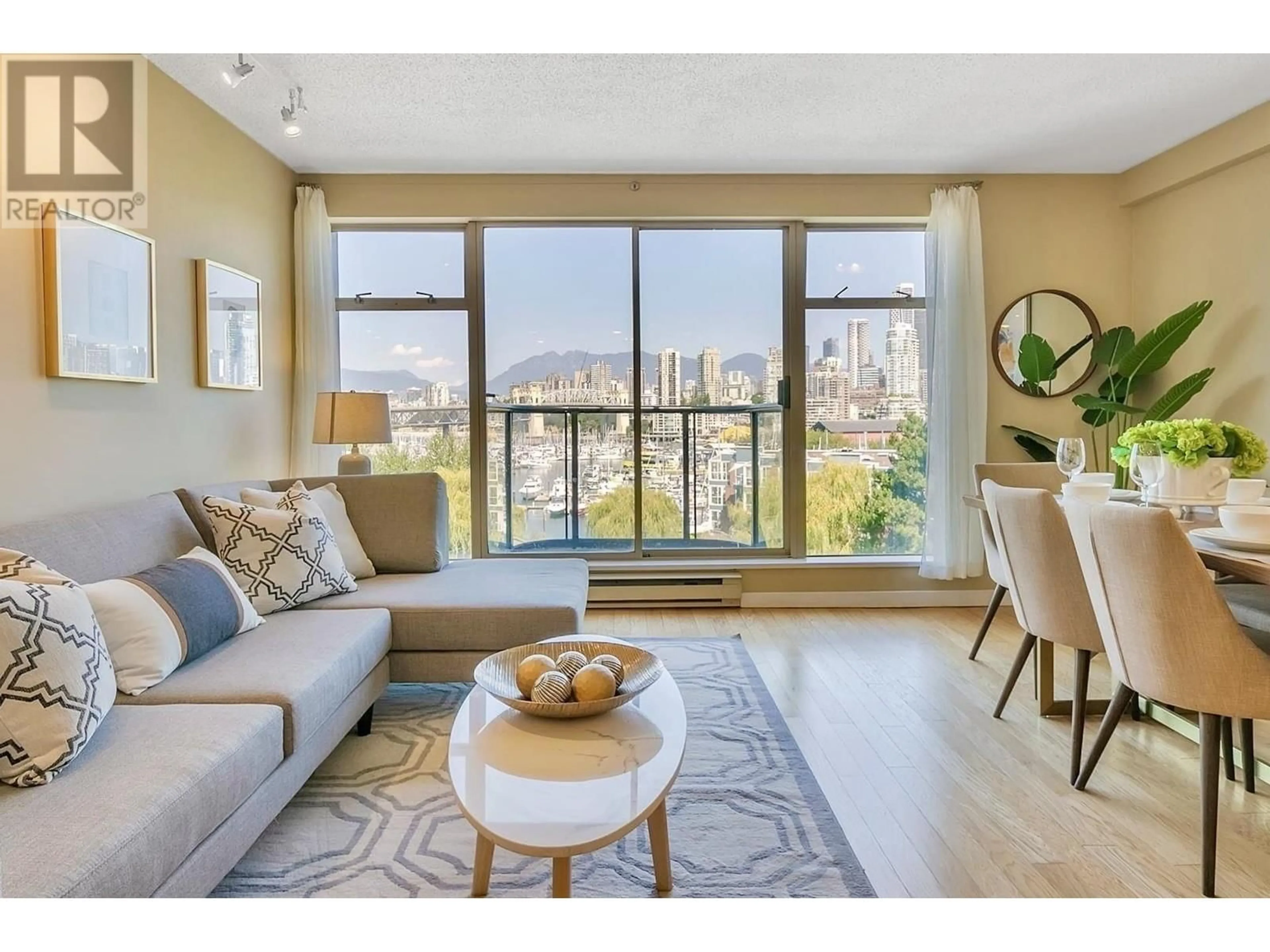 Living room with furniture, wood/laminate floor for 535 1515 W 2ND AVENUE, Vancouver British Columbia V6J5C5