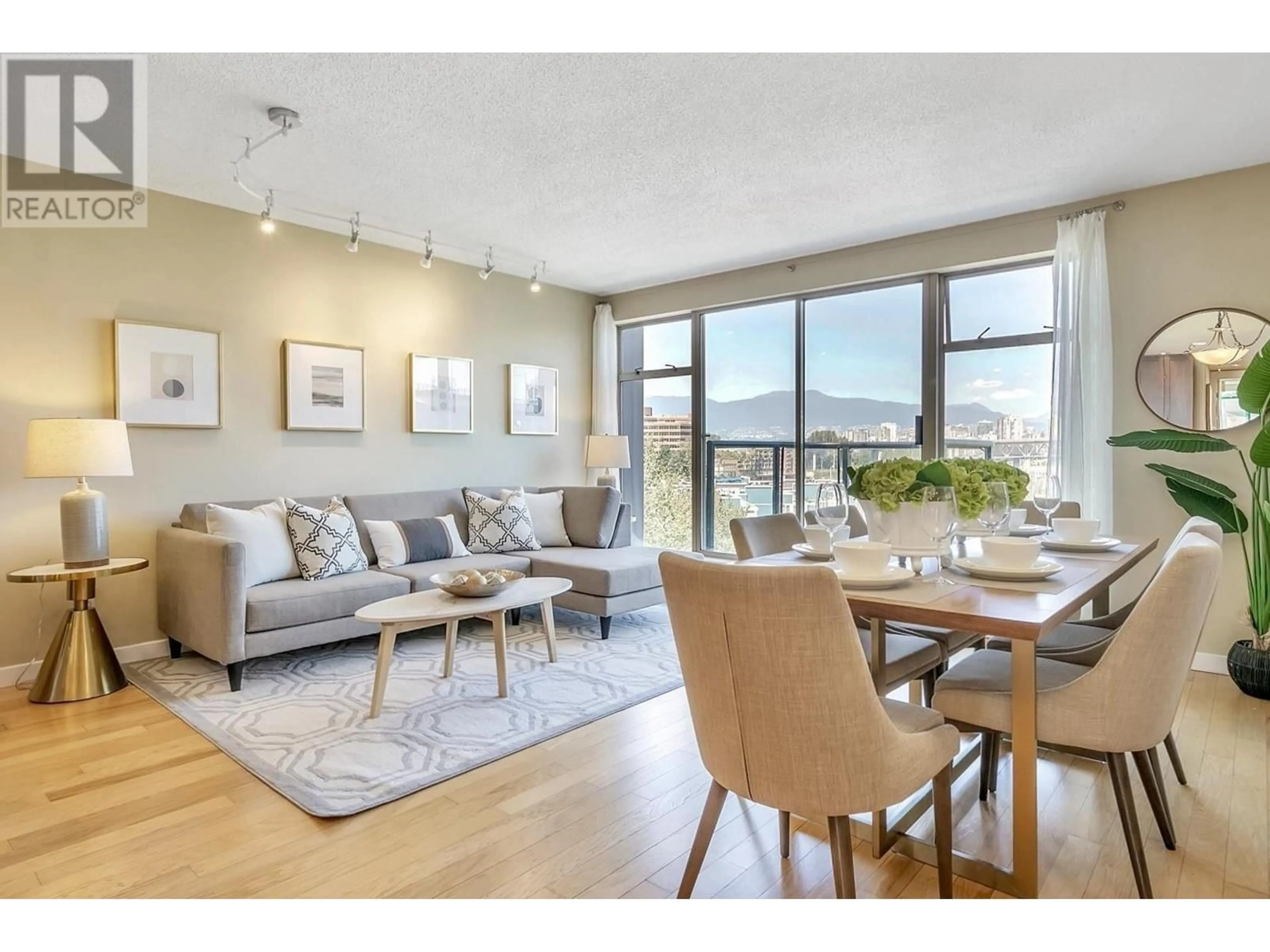 Living room with furniture, wood/laminate floor for 535 1515 W 2ND AVENUE, Vancouver British Columbia V6J5C5