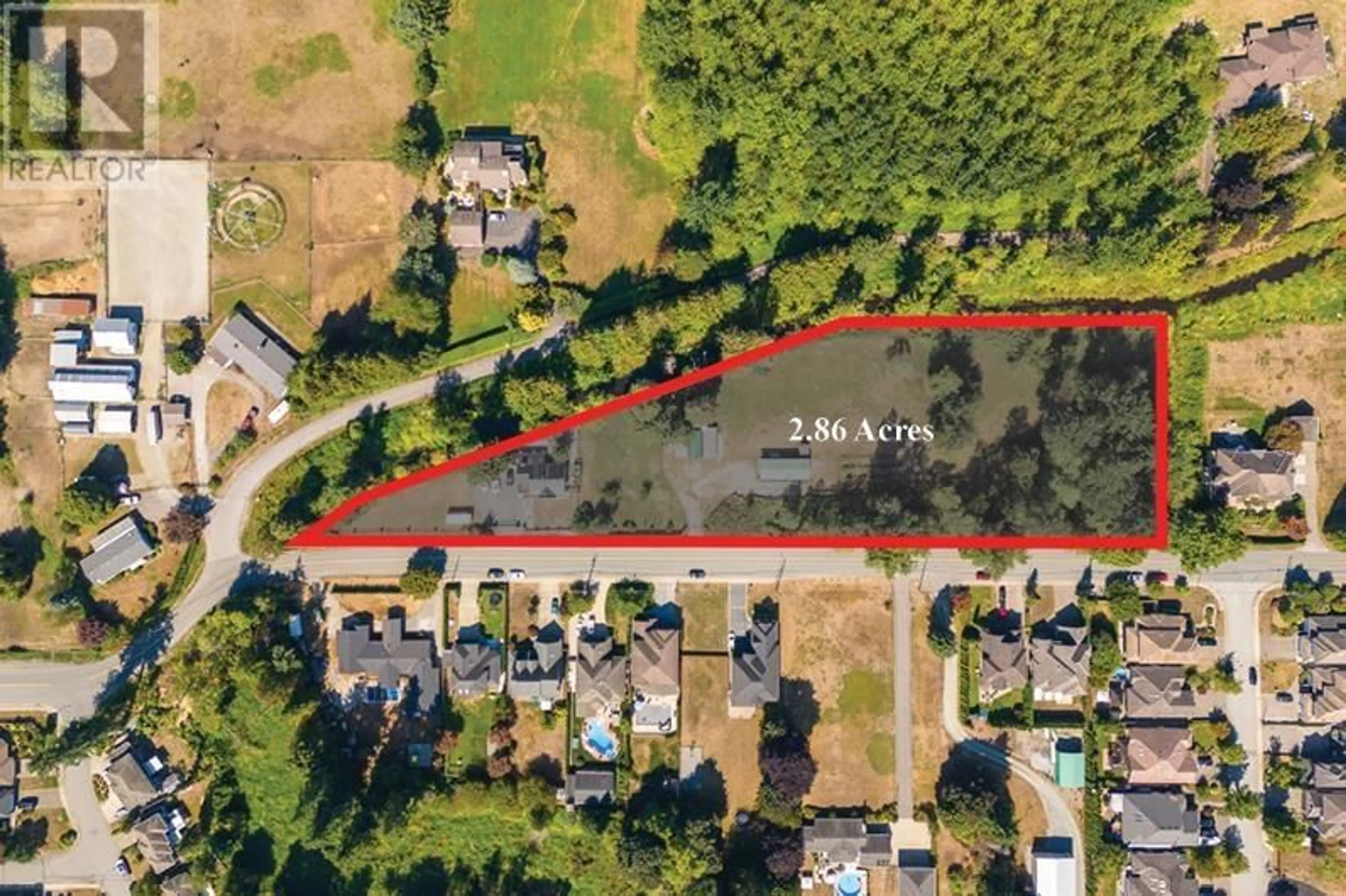 A pic from outside/outdoor area/front of a property/back of a property/a pic from drone, street for 20515 POWELL AVENUE, Maple Ridge British Columbia V2X4N3