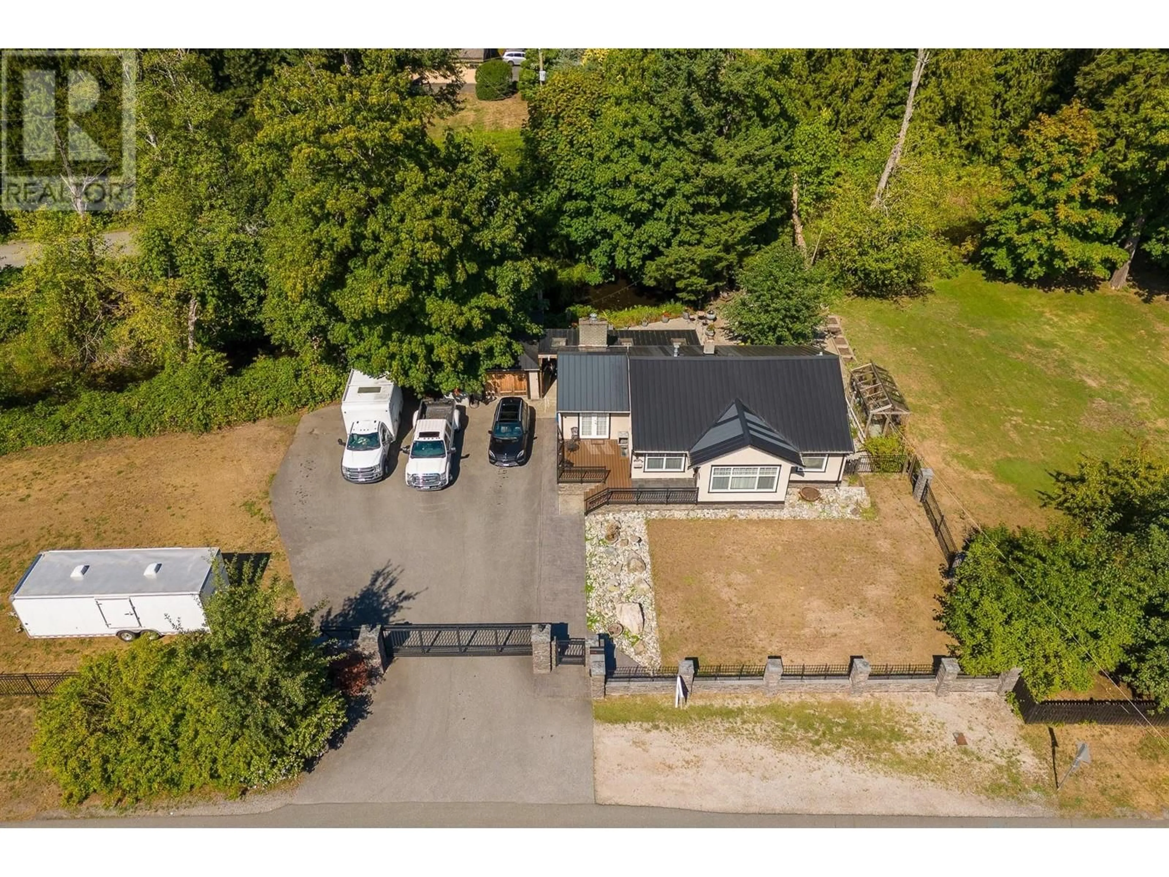 A pic from outside/outdoor area/front of a property/back of a property/a pic from drone, street for 20515 POWELL AVENUE, Maple Ridge British Columbia V2X4N3