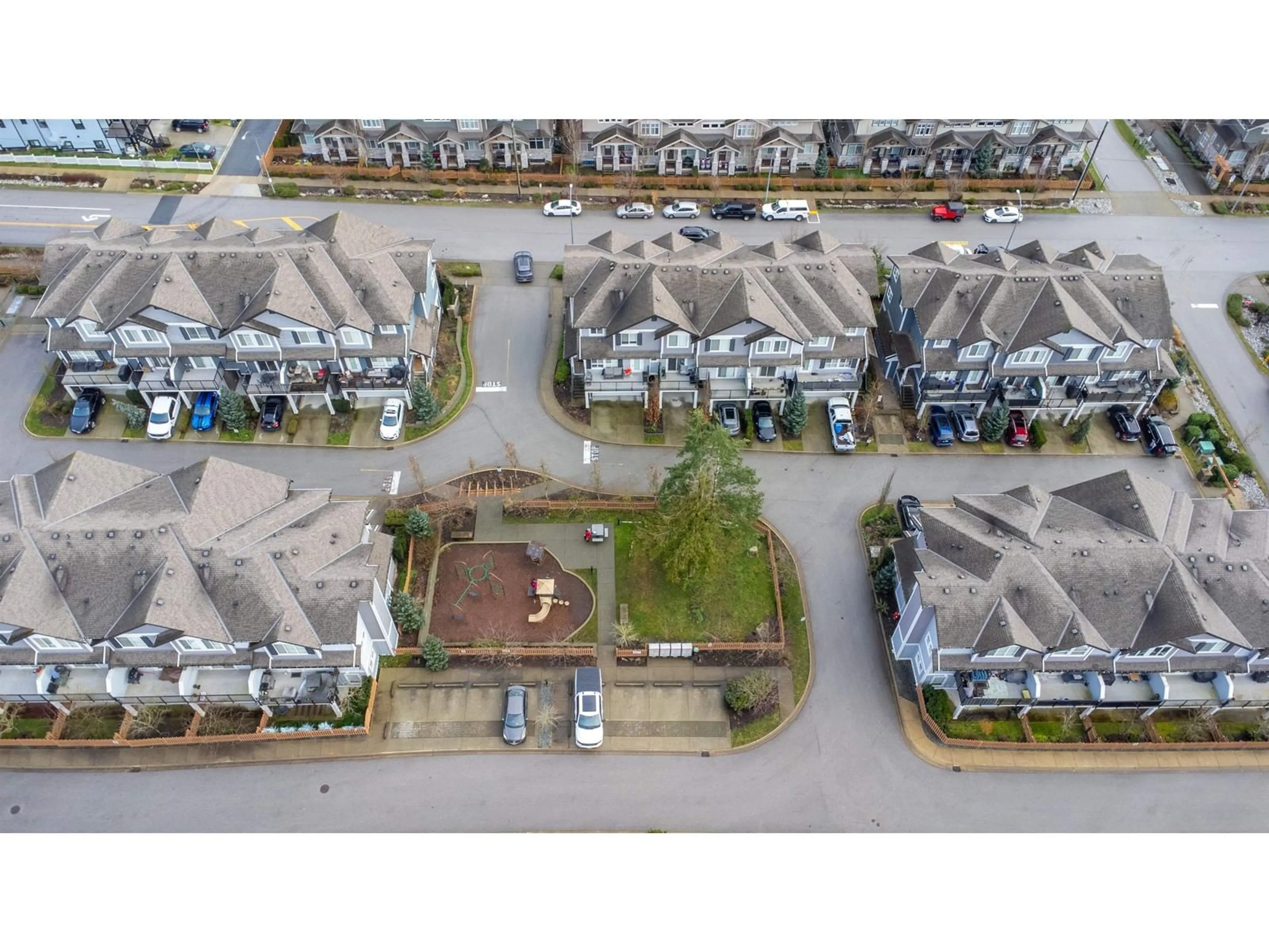 A pic from outside/outdoor area/front of a property/back of a property/a pic from drone, street for 5 7157 210 STREET, Langley British Columbia V2Y0T3