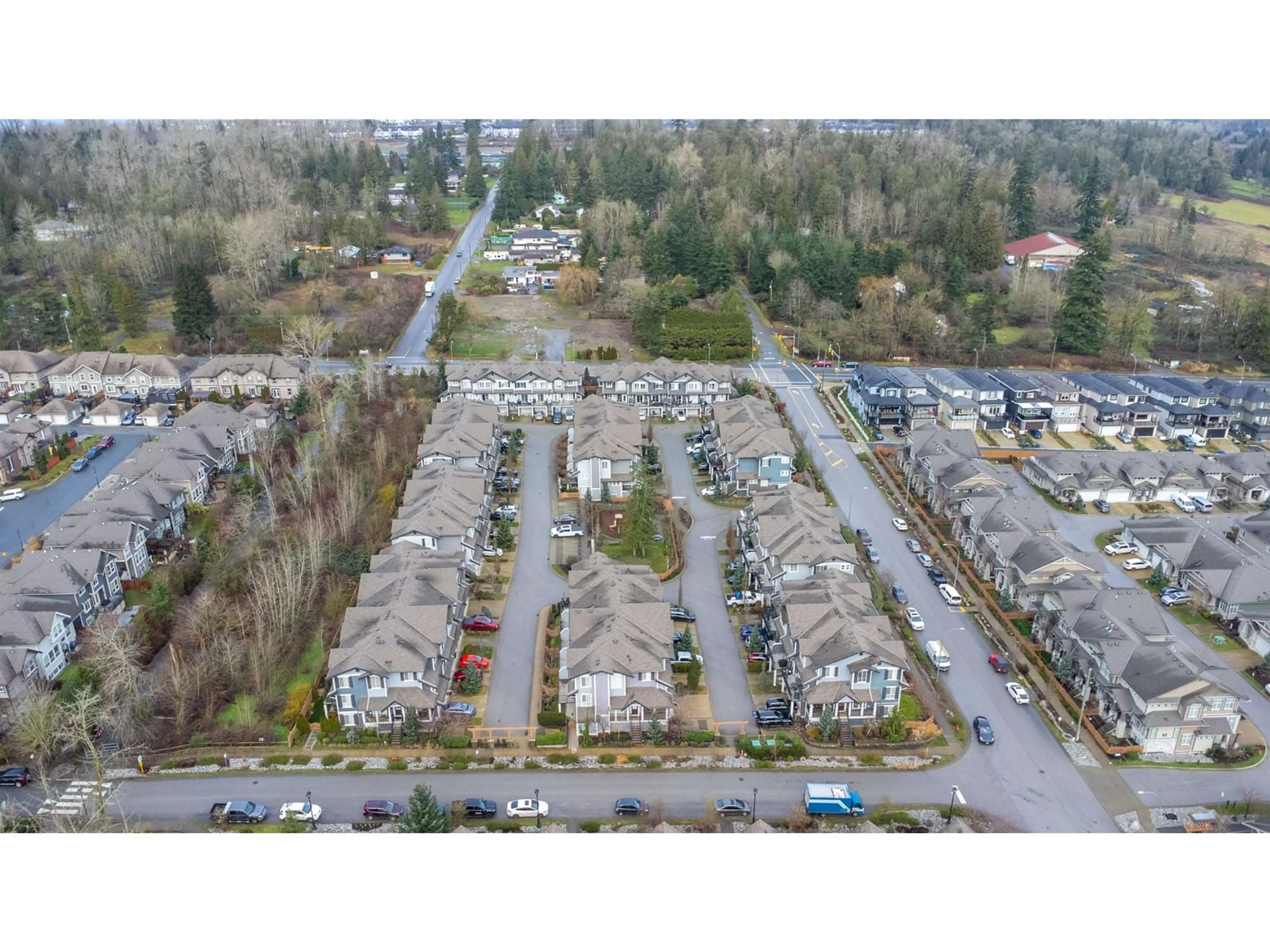 A pic from outside/outdoor area/front of a property/back of a property/a pic from drone, street for 5 7157 210 STREET, Langley British Columbia V2Y0T3