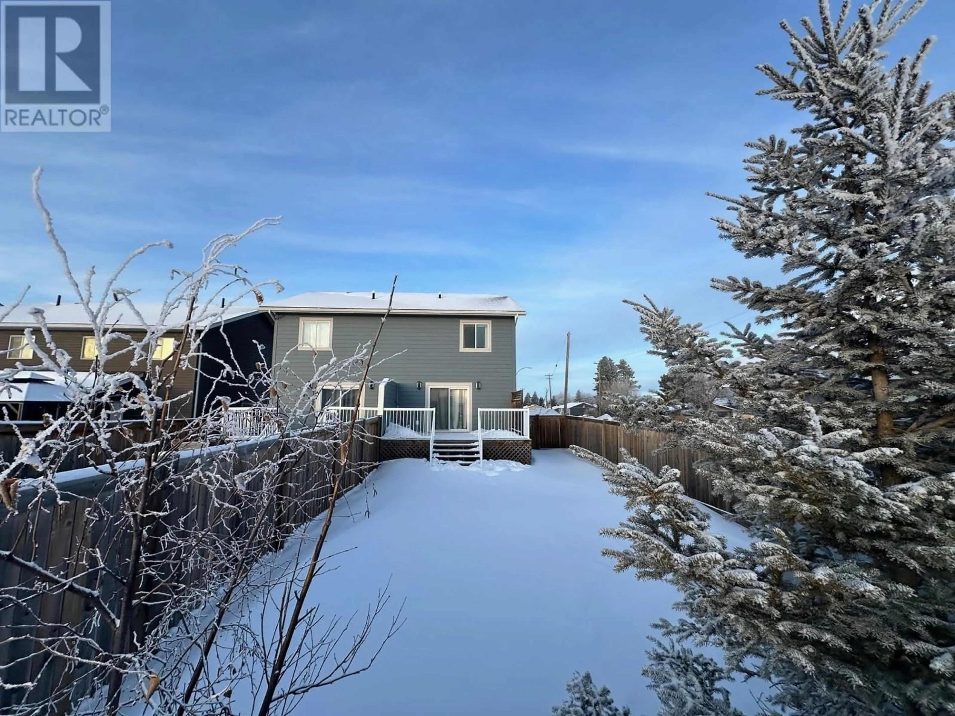 A pic from outside/outdoor area/front of a property/back of a property/a pic from drone, unknown for 9203 102 AVENUE, Fort St. John British Columbia V1J0J9