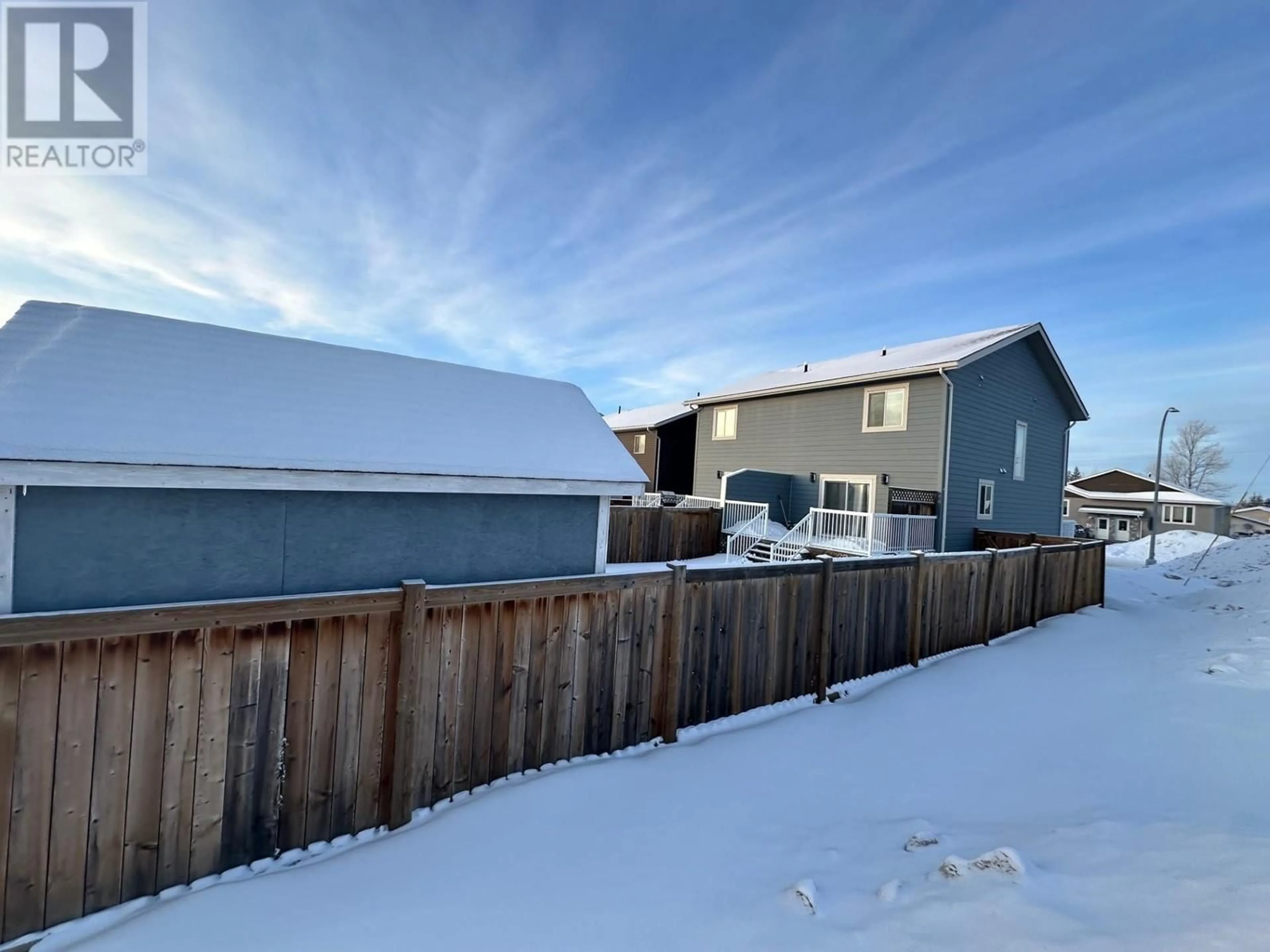 A pic from outside/outdoor area/front of a property/back of a property/a pic from drone, unknown for 9203 102 AVENUE, Fort St. John British Columbia V1J0J9