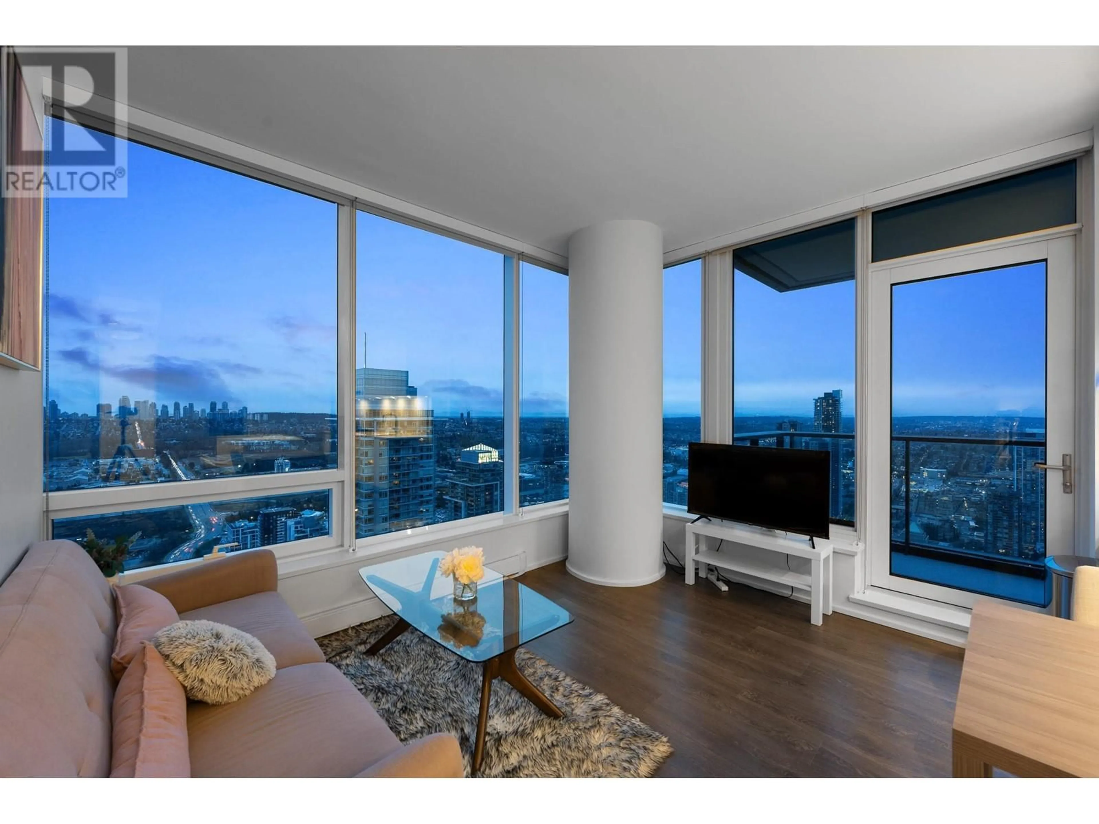 Living room with furniture, wood/laminate floor for 5507 4510 HALIFAX WAY, Burnaby British Columbia V5C0K4