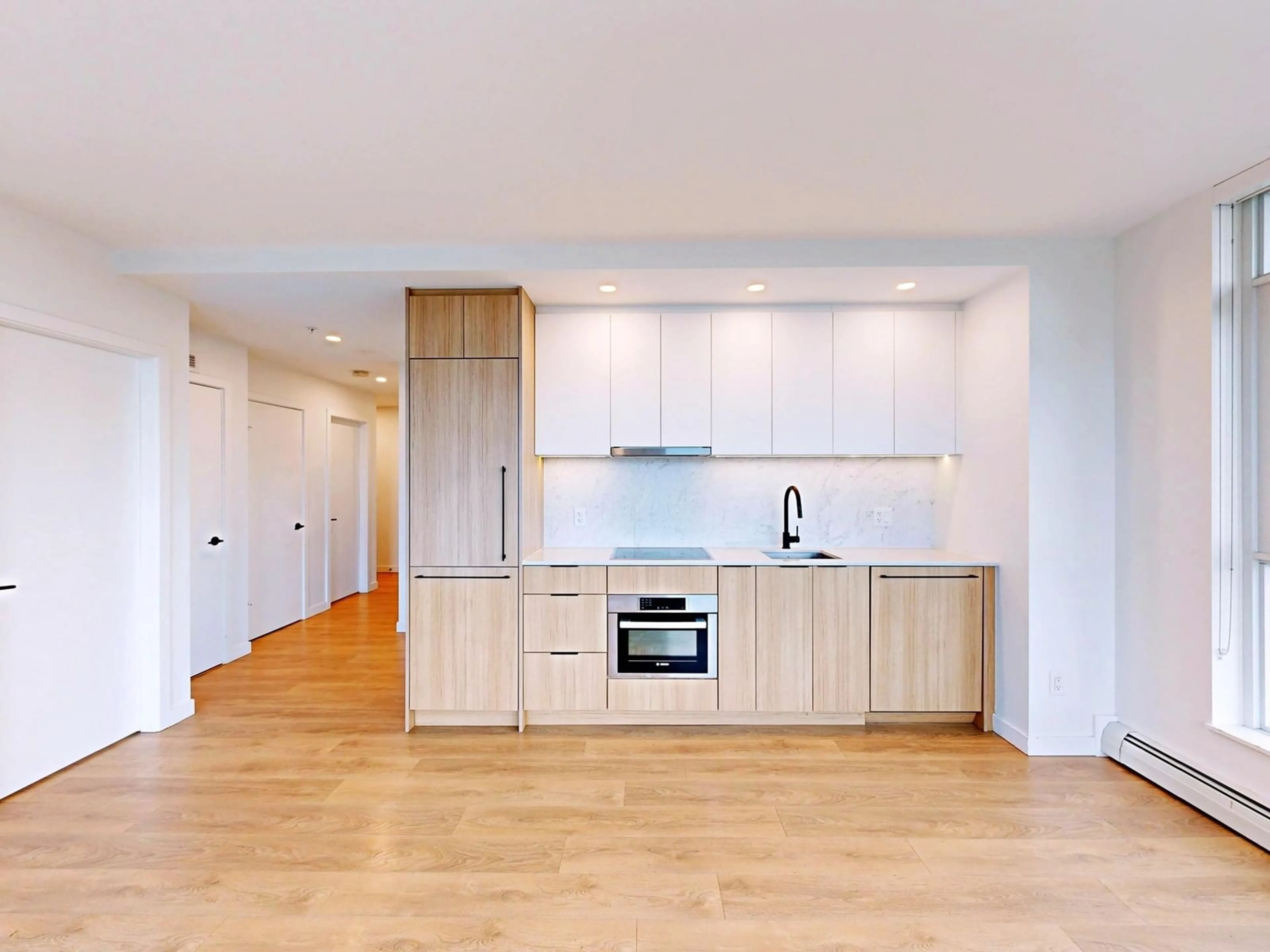 Open concept kitchen, wood/laminate floor for 2708 13685 102 AVENUE, Surrey British Columbia V3T0S2