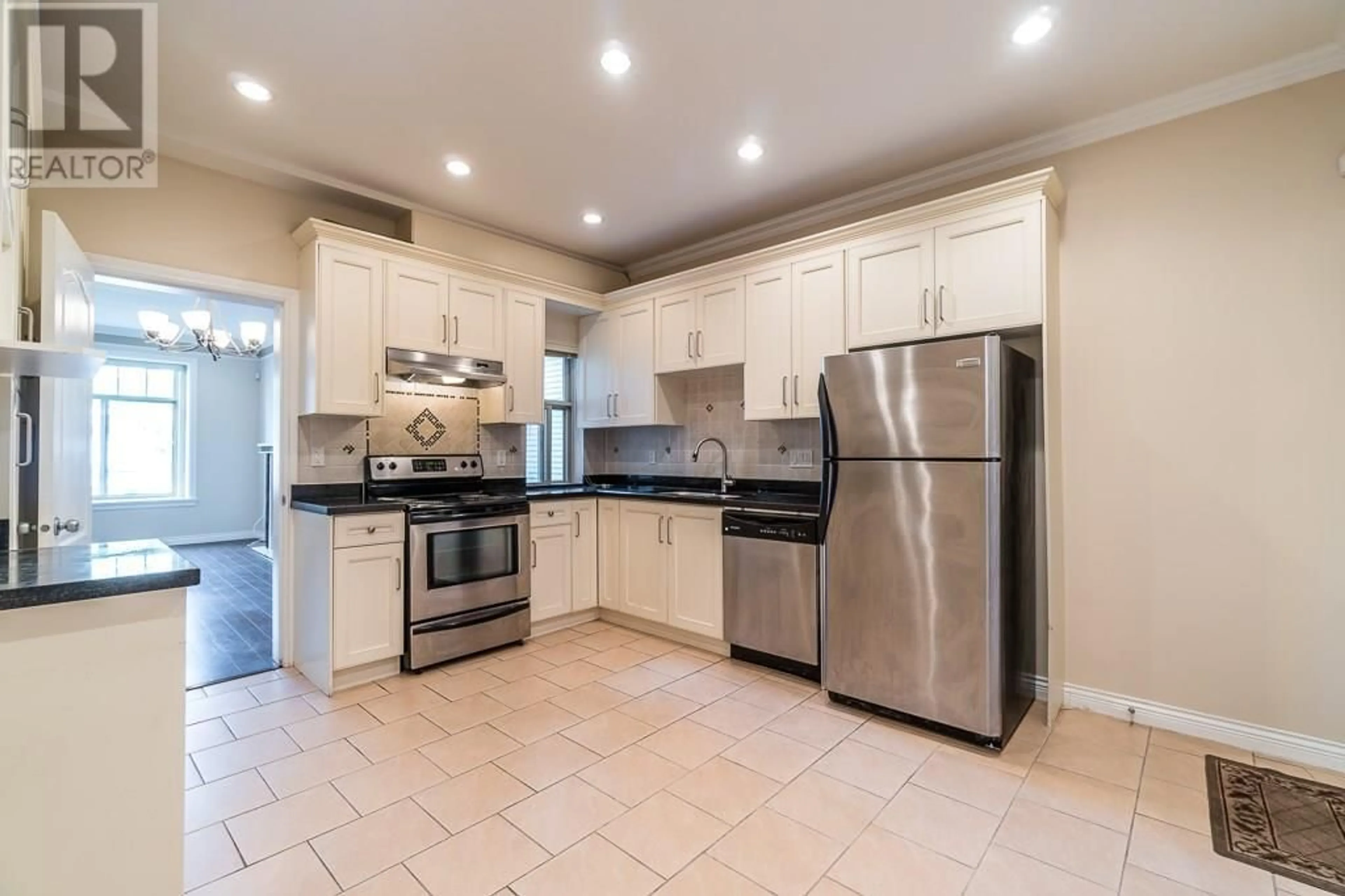 Open concept kitchen, ceramic/tile floor for 7734 16TH AVENUE, Burnaby British Columbia V3N1P9